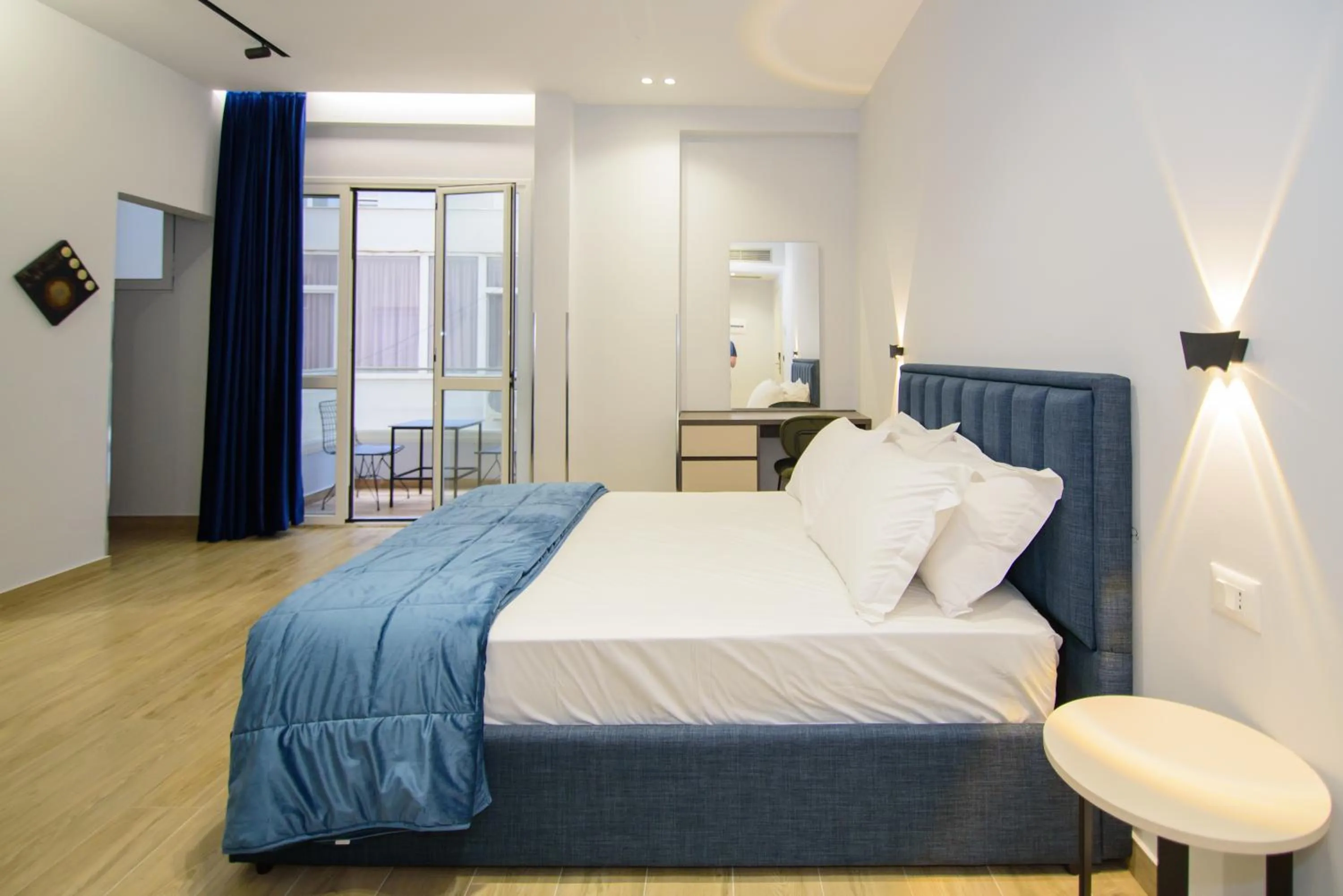 Bed in Palm Side Hotel