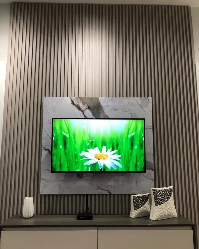 Communal lounge/ TV room in Palm Side Hotel