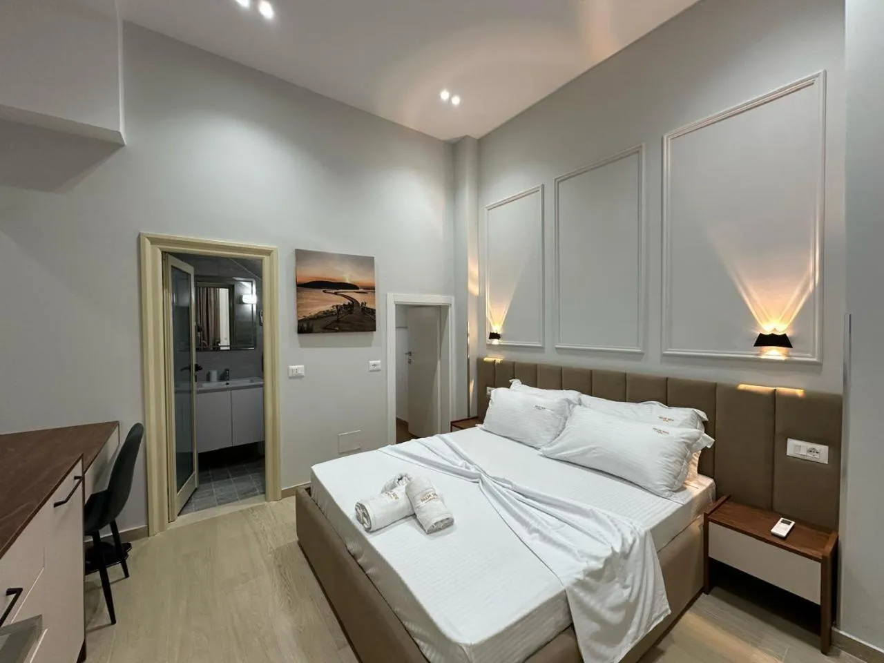 Bed in Palm Side Hotel