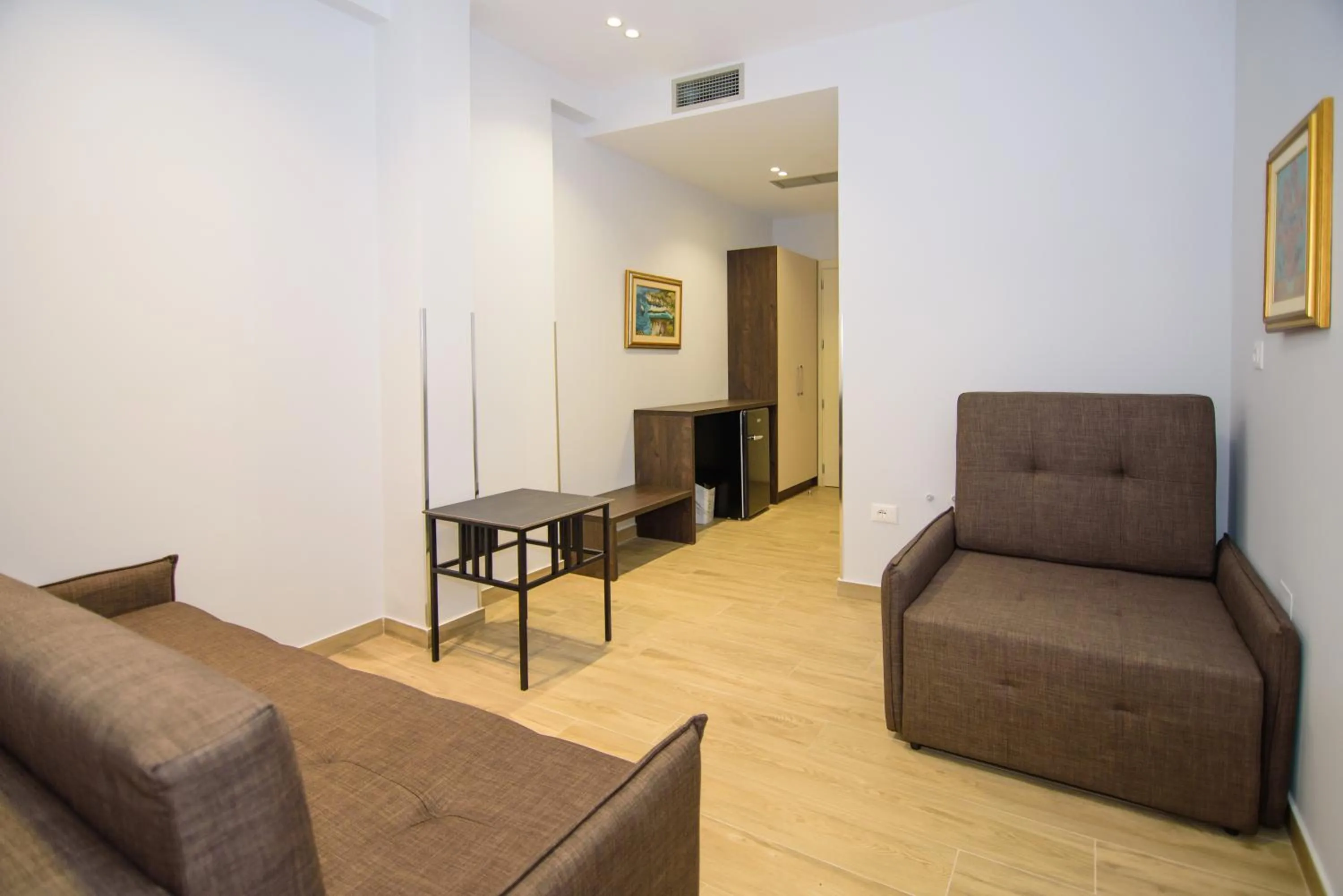 Living room in Palm Side Hotel