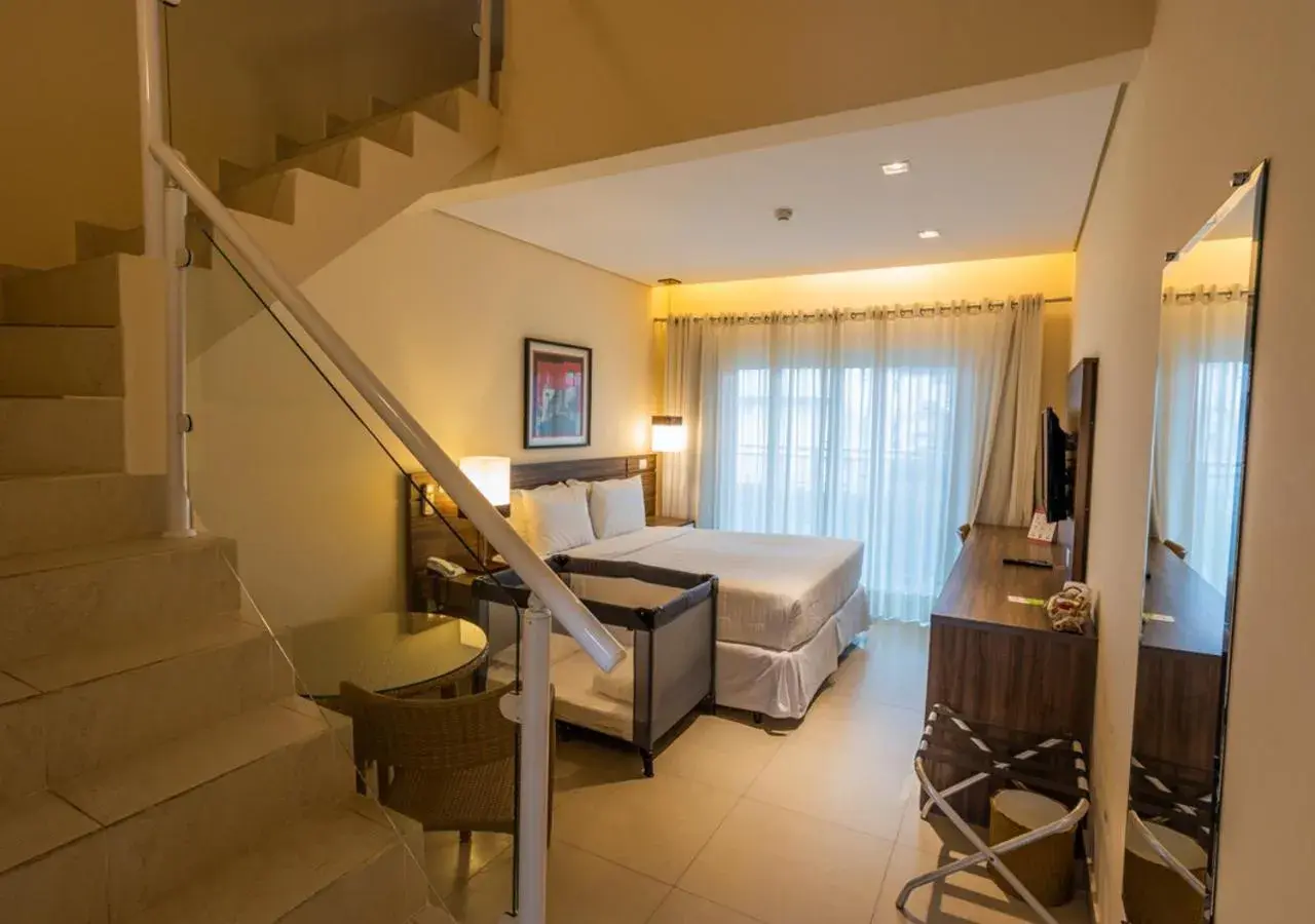 Deluxe Quadruple Room in Amora Hotel Maresias Deluxe Quadruple Room in Amora Hotel Maresias