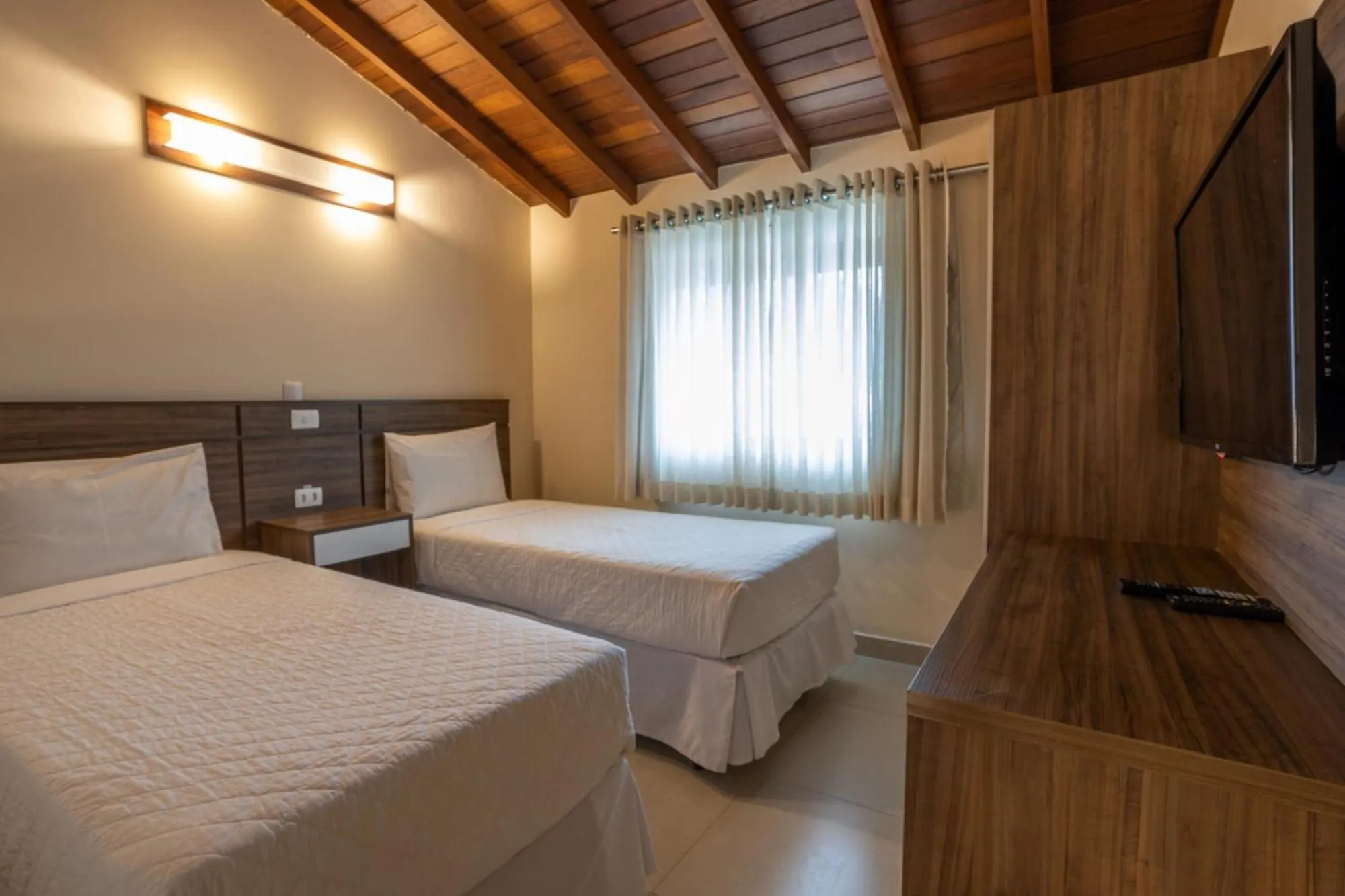 Bed in Amora Hotel Maresias