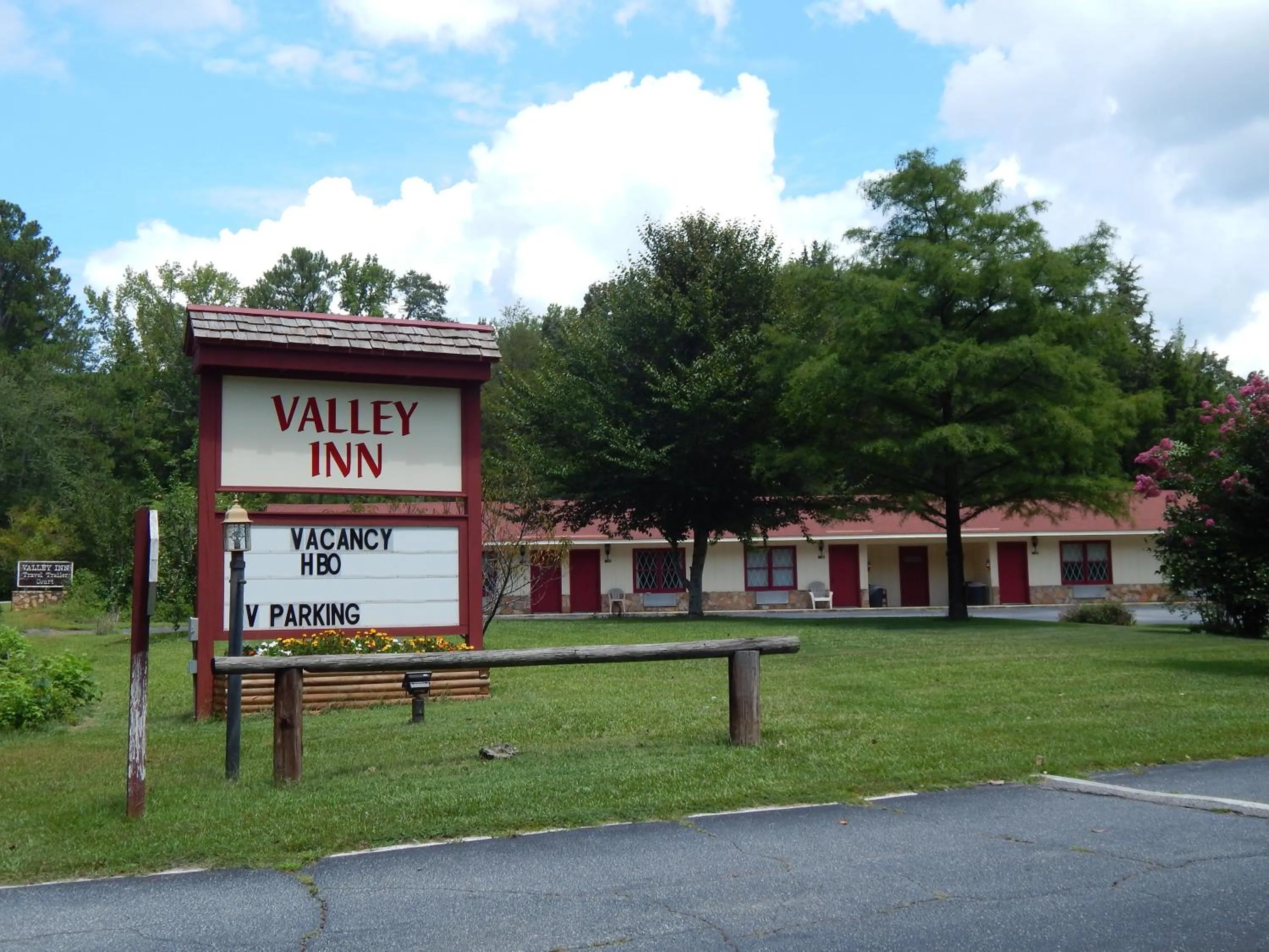 Property logo or sign in Valley Inn - Hamilton Ga
