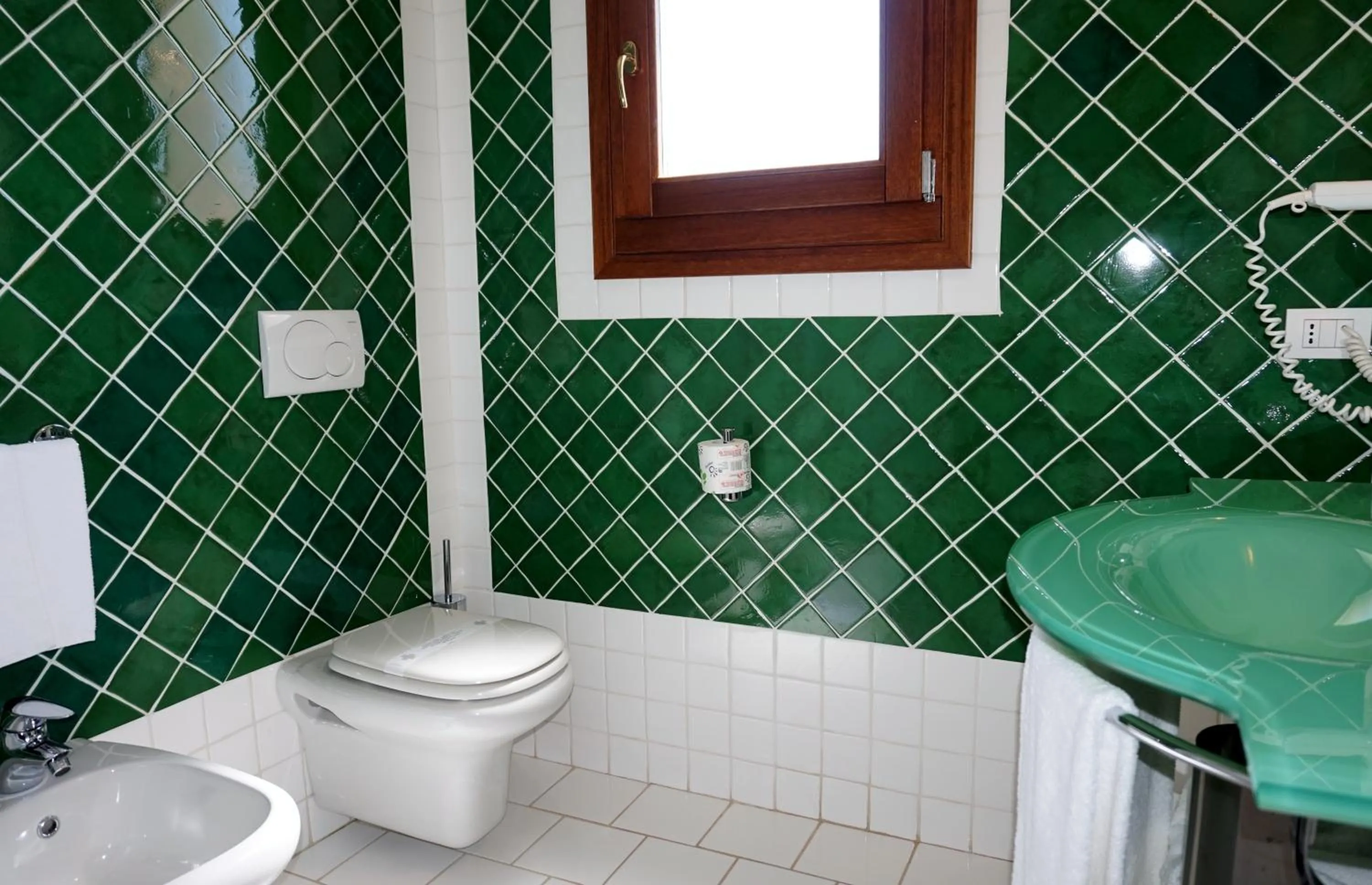 Bathroom in Hotel Monti Di Mola