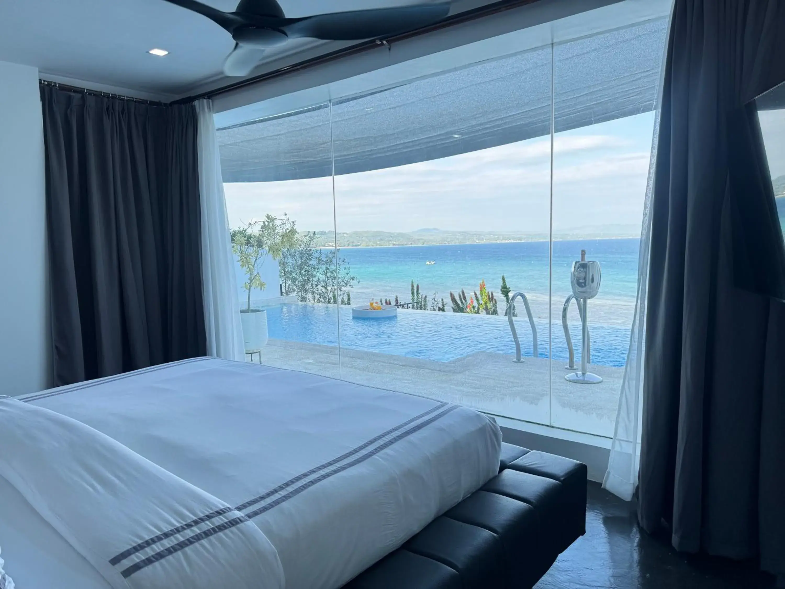 Balcony/Terrace, Bed in Epic Suites Bohol ADULTS ONLY Balcony/Terrace, Bed in Epic Suites Bohol ADULTS ONLY