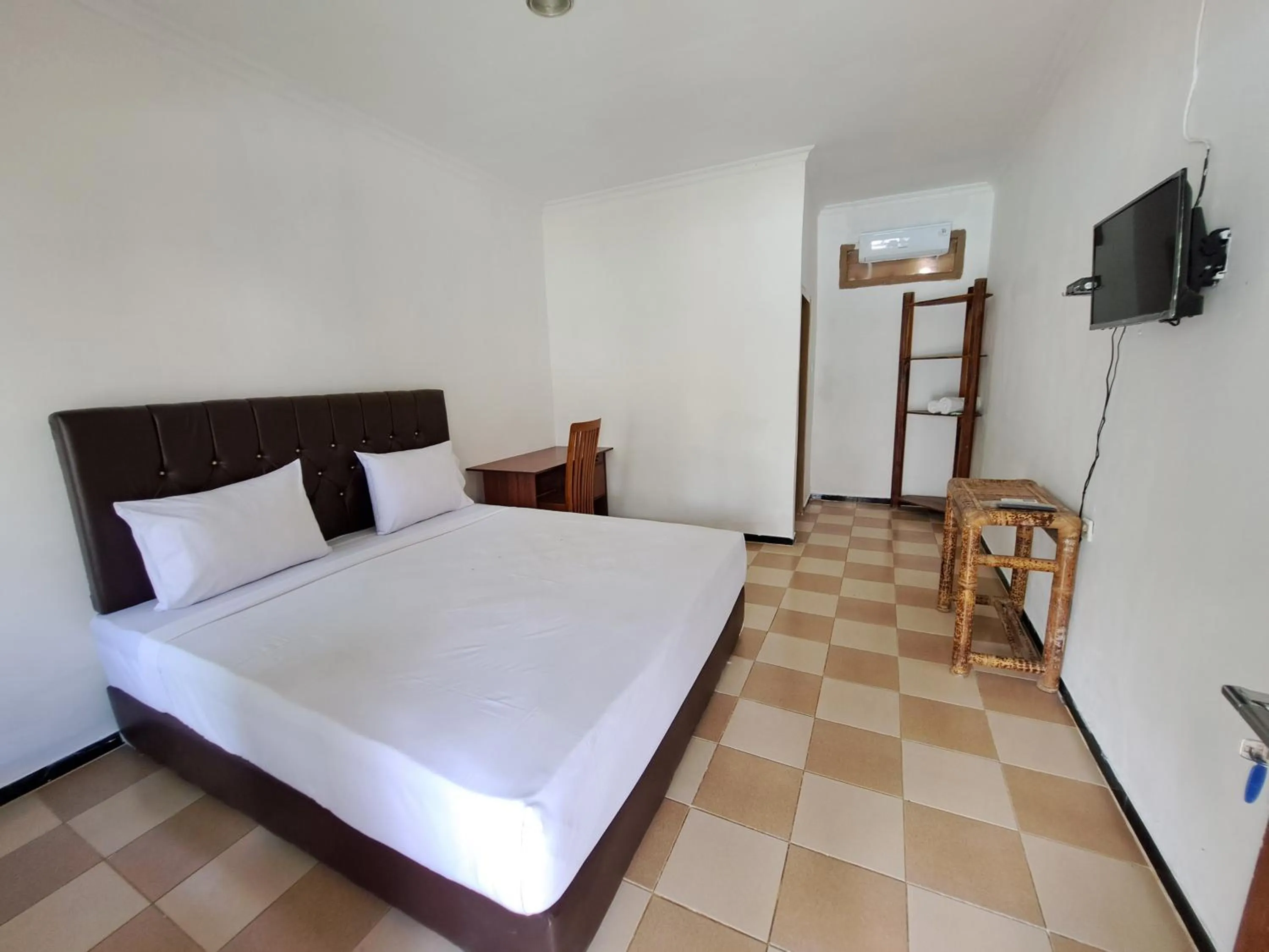 Bed in Surfers Beachfront Lombok