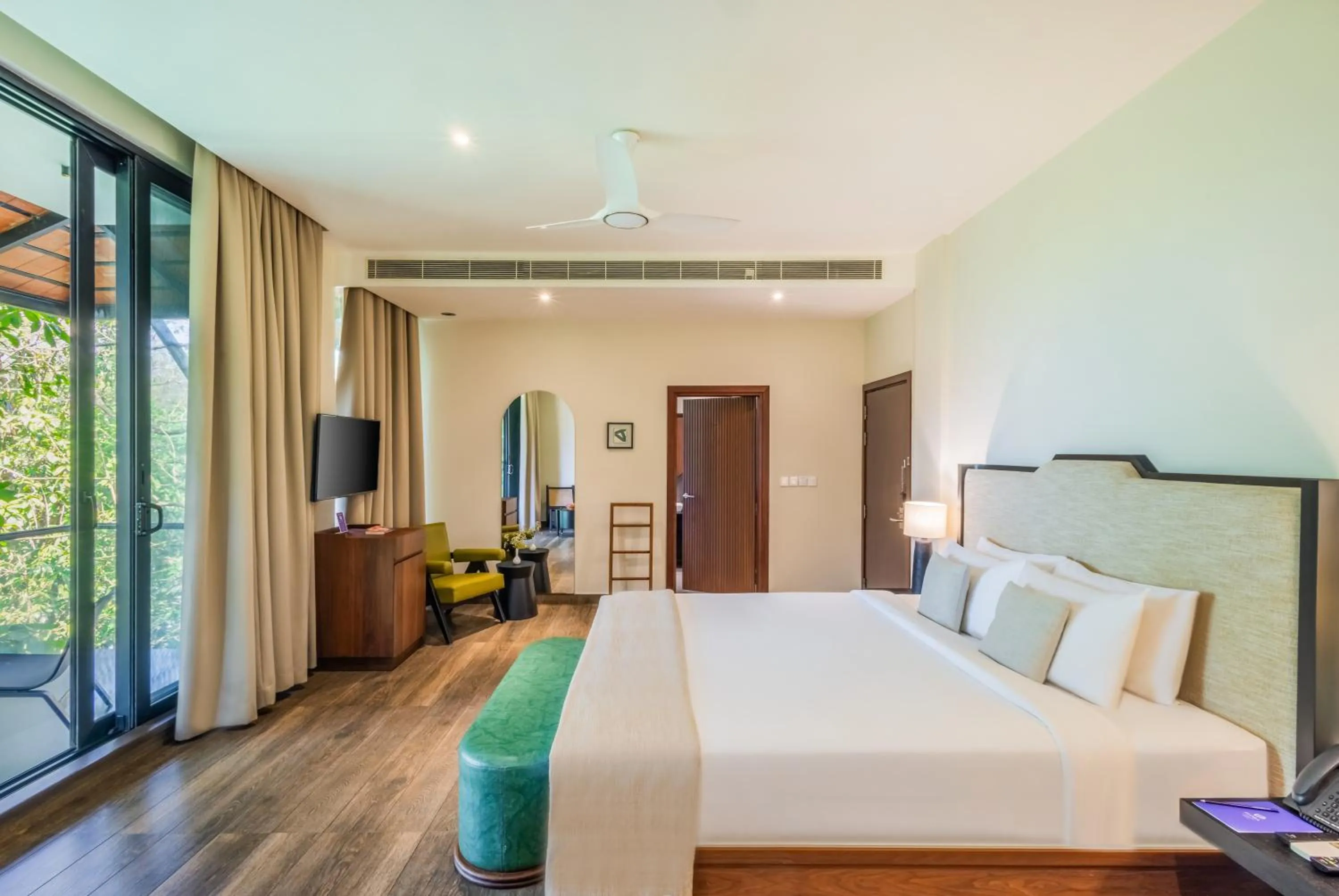 Bed in Flora Vythiri Resort Wayanad