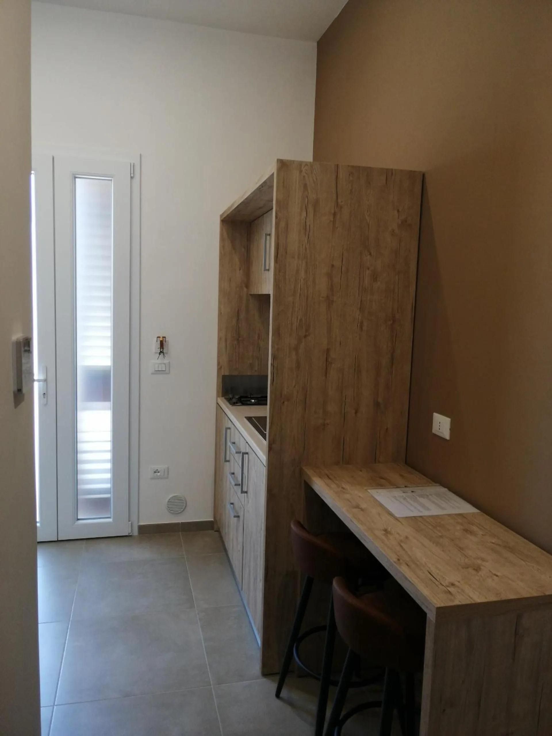 Kitchen or kitchenette in Aia Grande