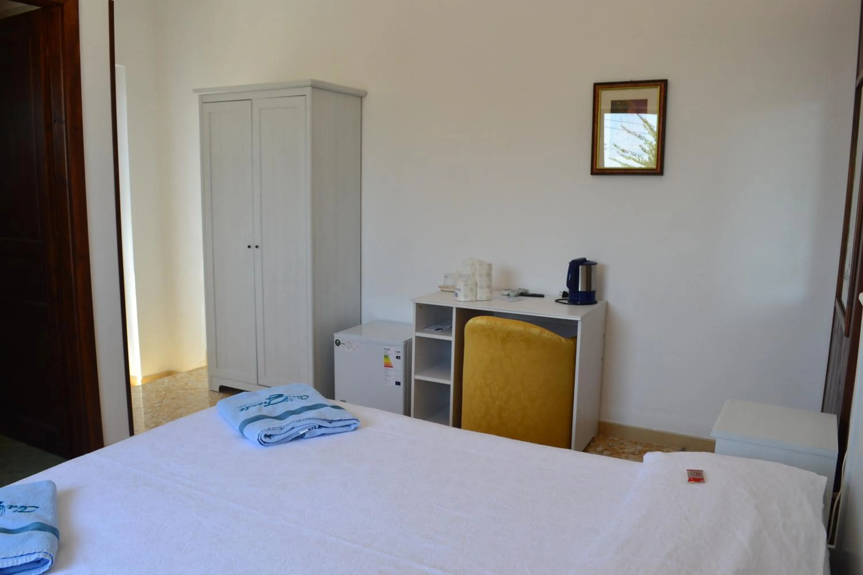 Photo of the whole room, Bed in Aia Grande