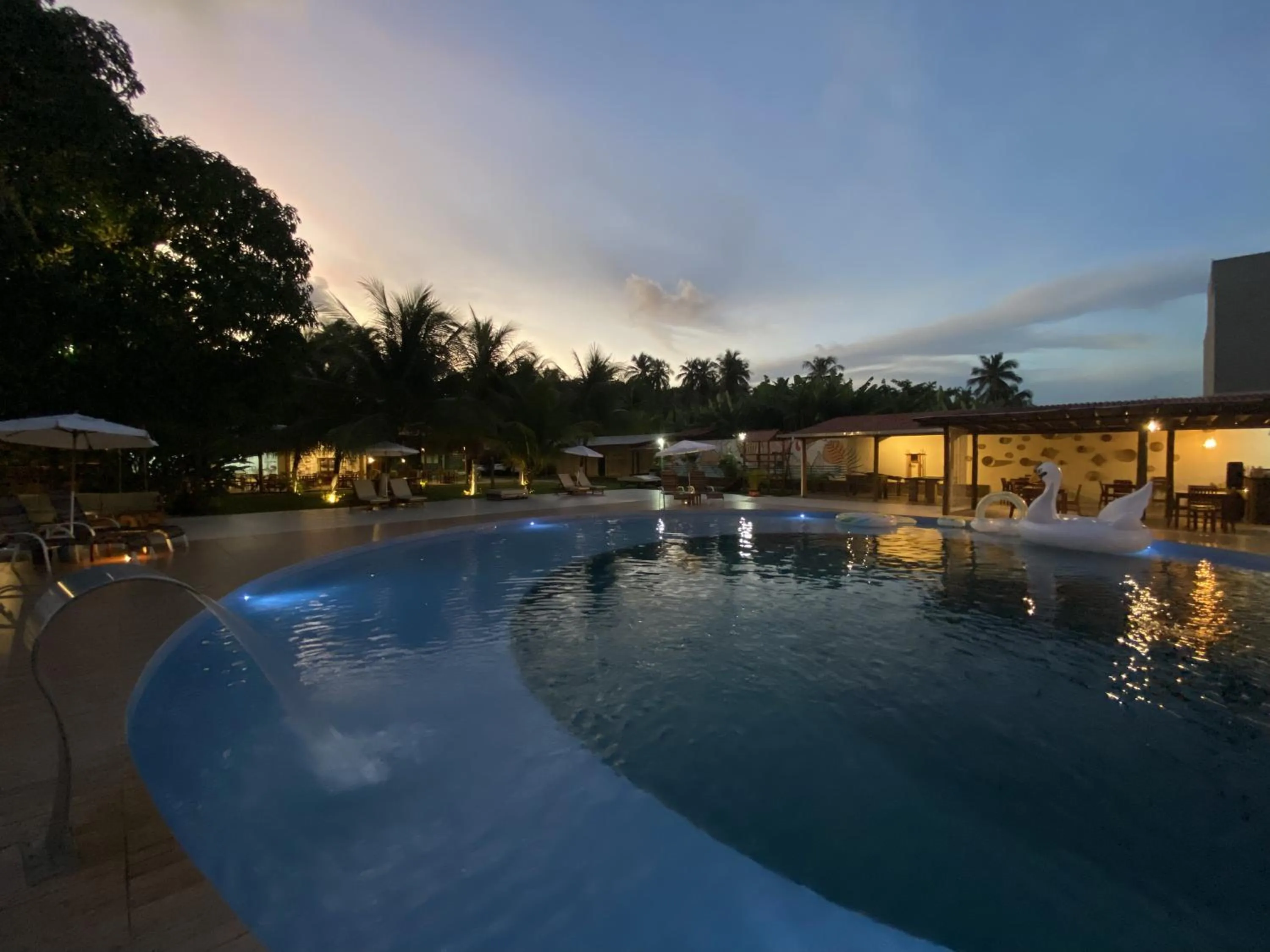 Swimming pool in Pousada o Casarão