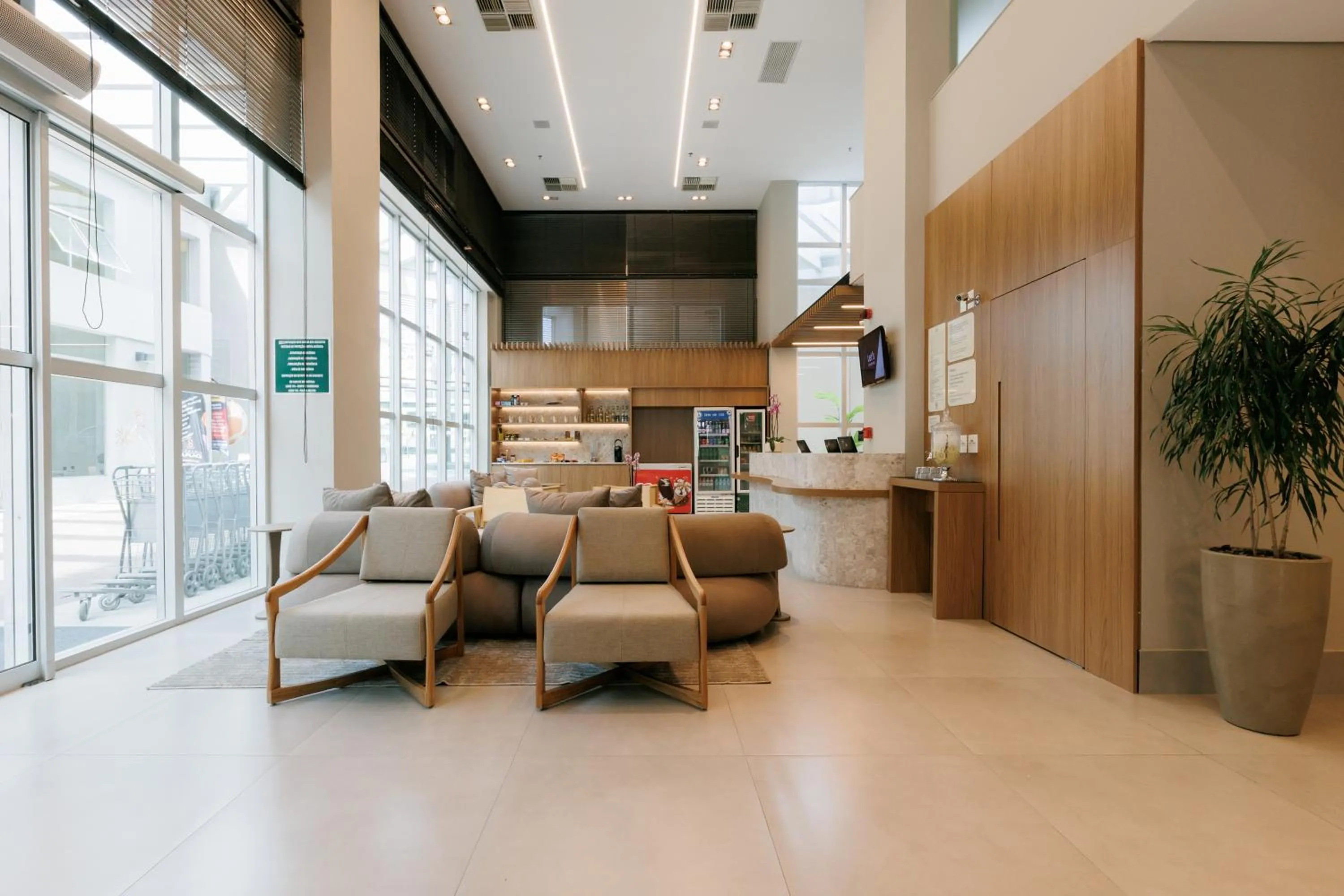 Lobby or reception in eSuites Belo Horizonte Minascasa