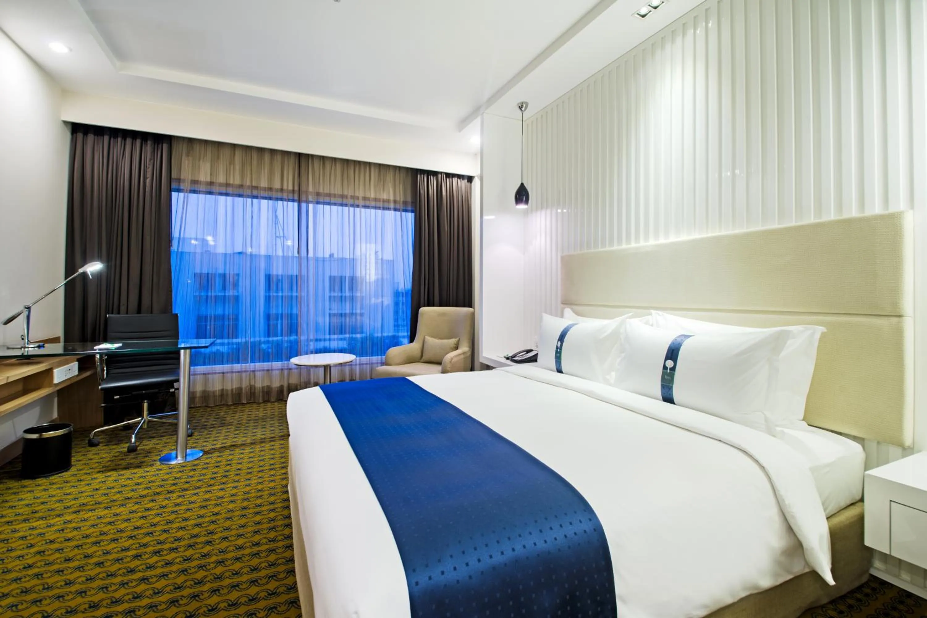 Bed in Holiday Inn Amritsar Ranjit Avenue by IHG