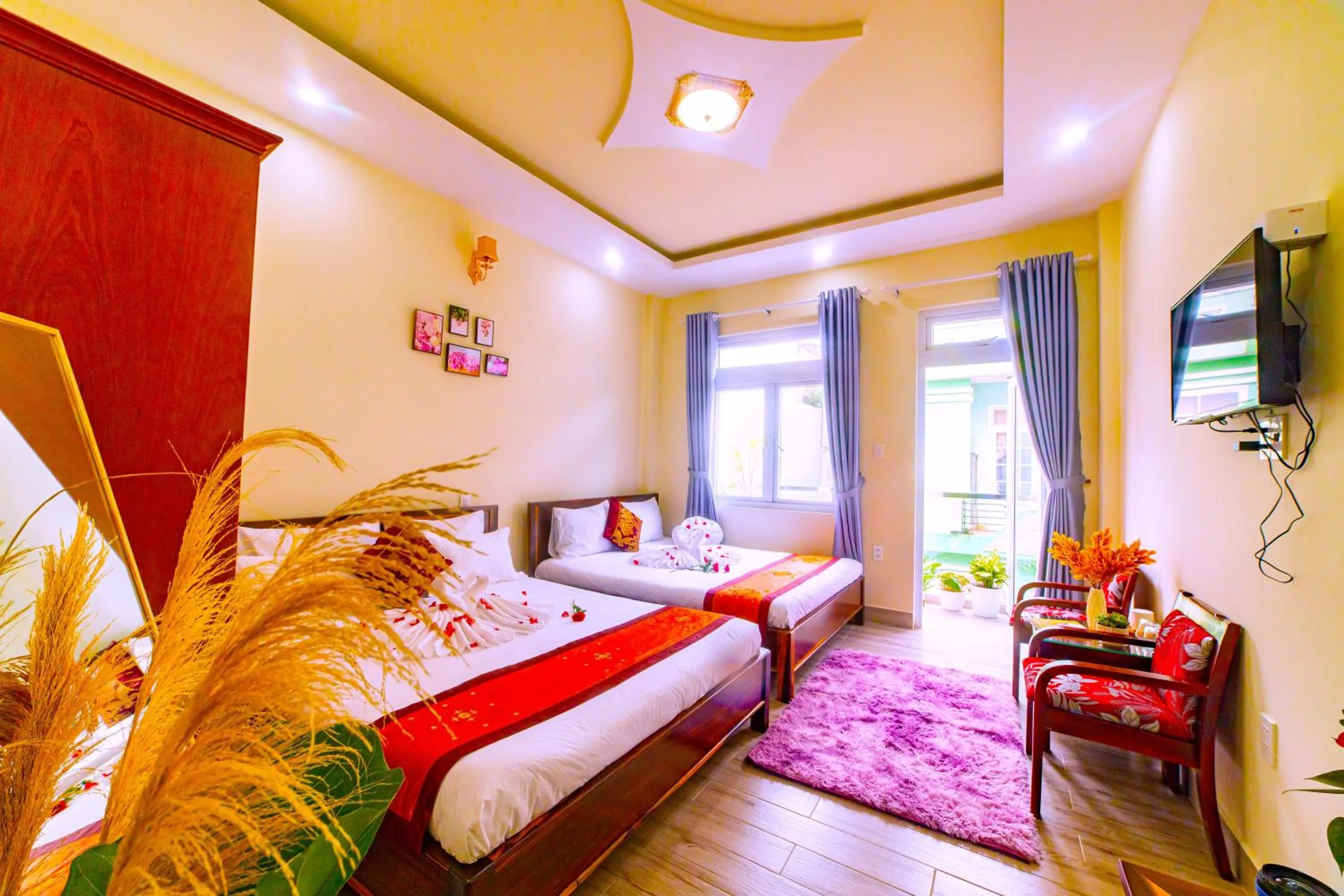 Communal lounge/ TV room, Bed in Nhat Hoang Homestay Da Lat