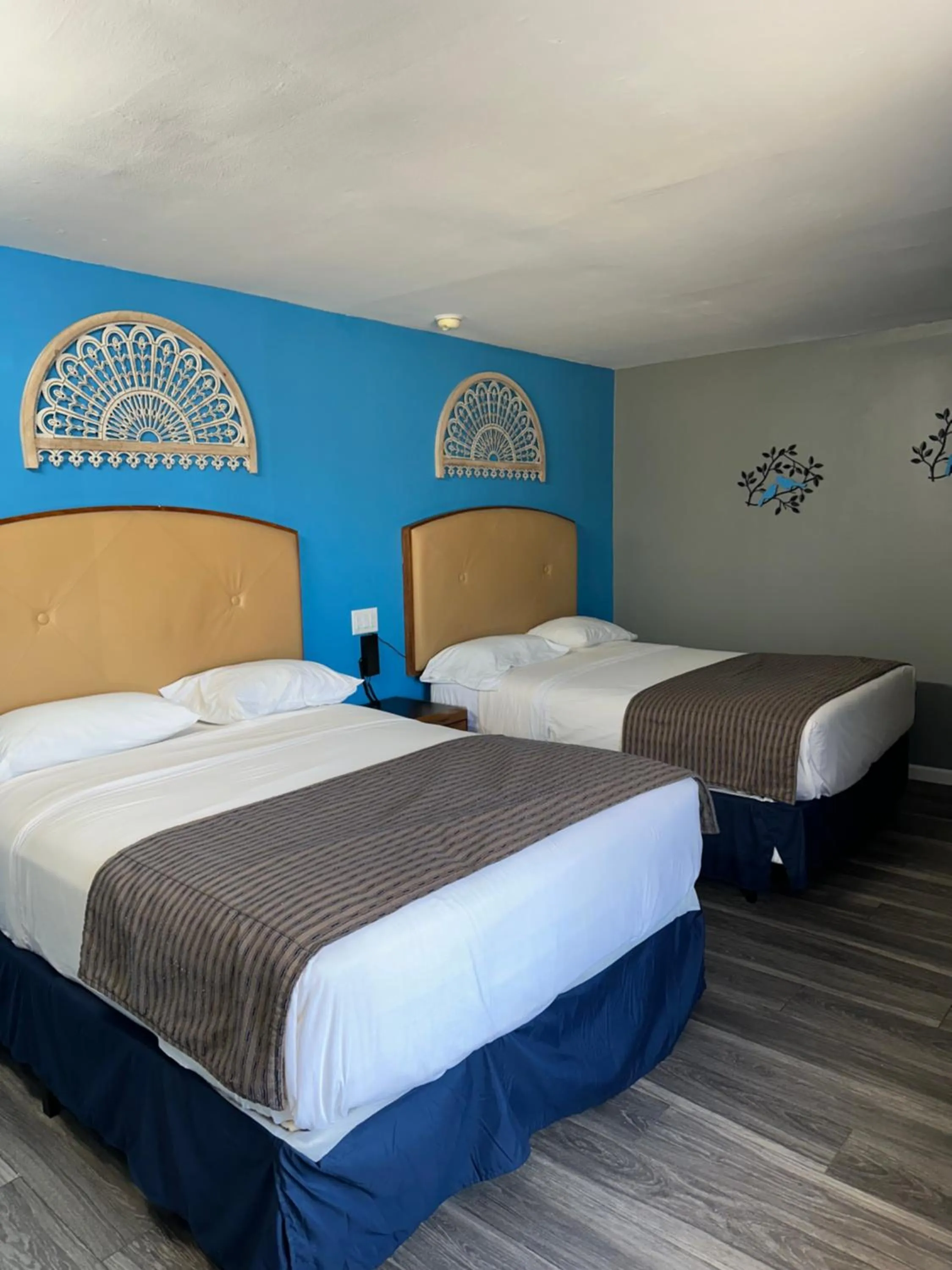 Bed in Travel Inn & Suites