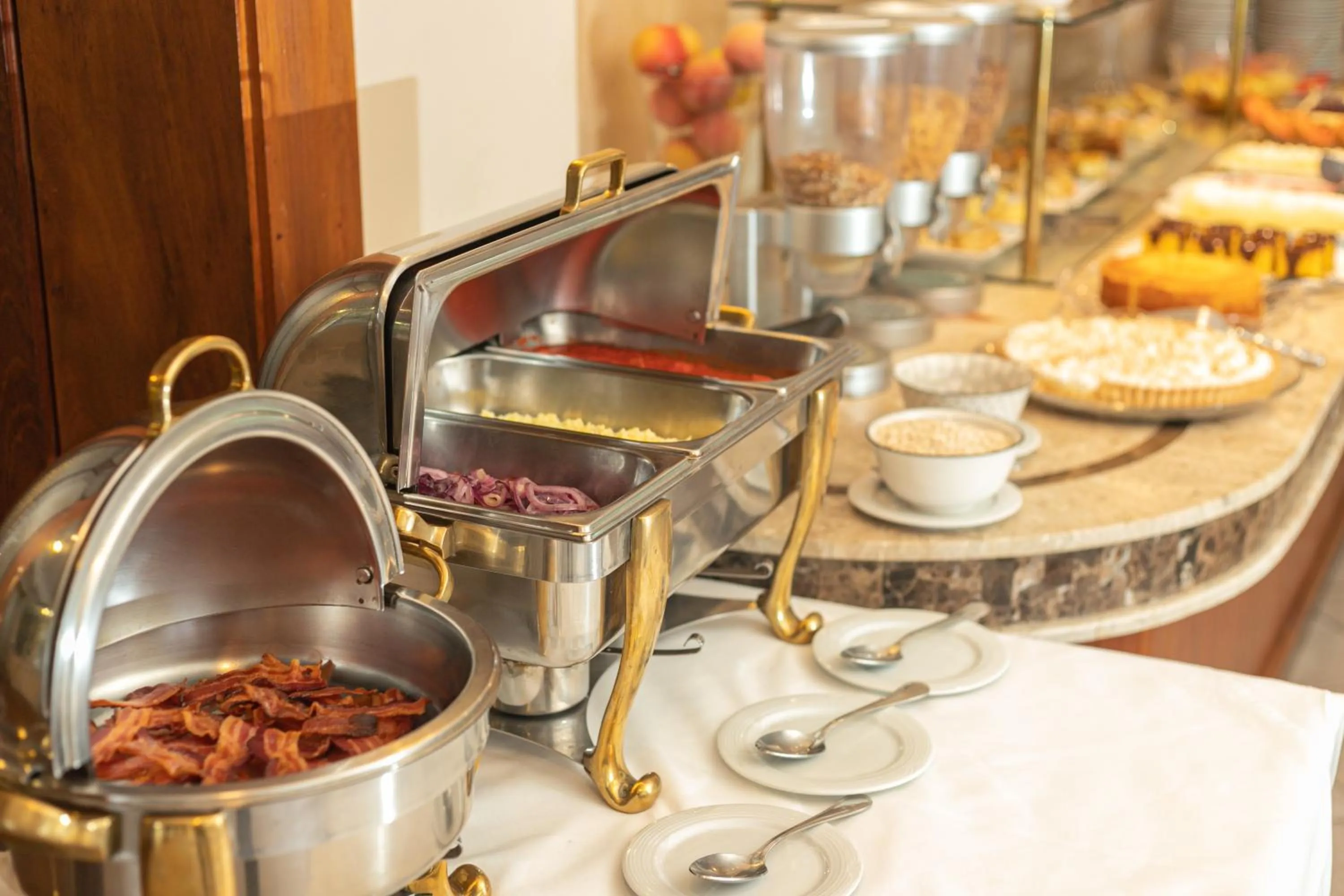Buffet breakfast in Le Suisse Elegance Hotel