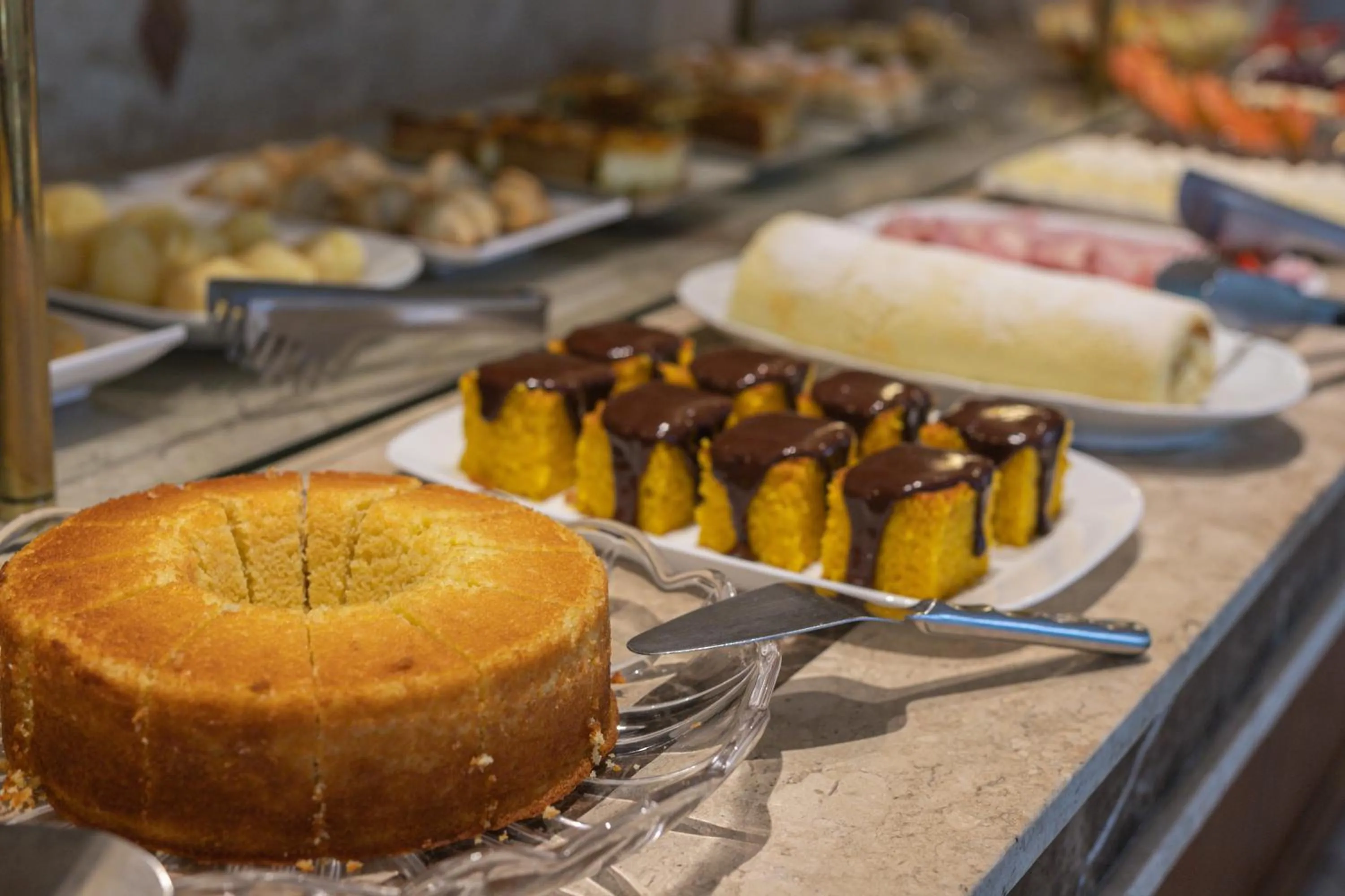 Buffet breakfast in Le Suisse Elegance Hotel