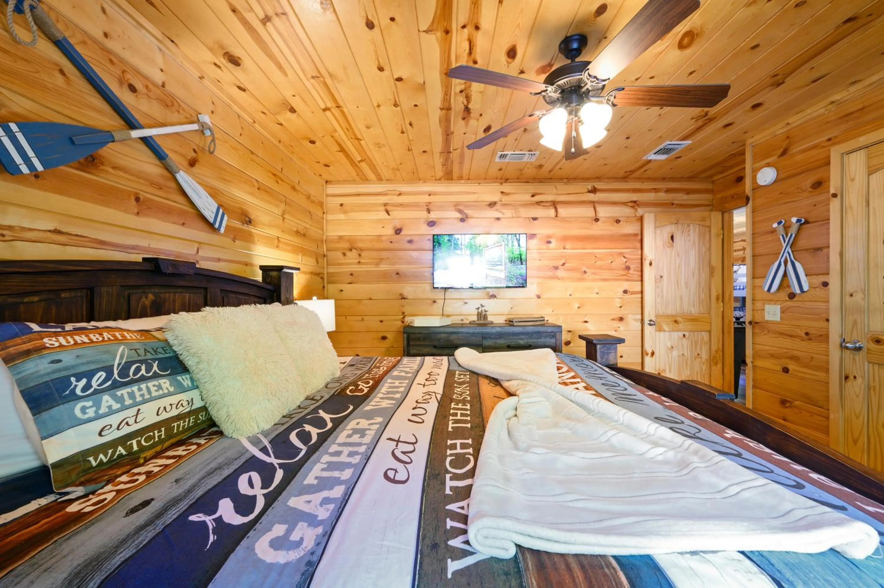 Bedroom, Bed in Hickory Bear - Cabin surrounded by pines, Sleeps 10, Hot Tub, Fire Pit, Arcade, Foosball Table & Deck Slide
