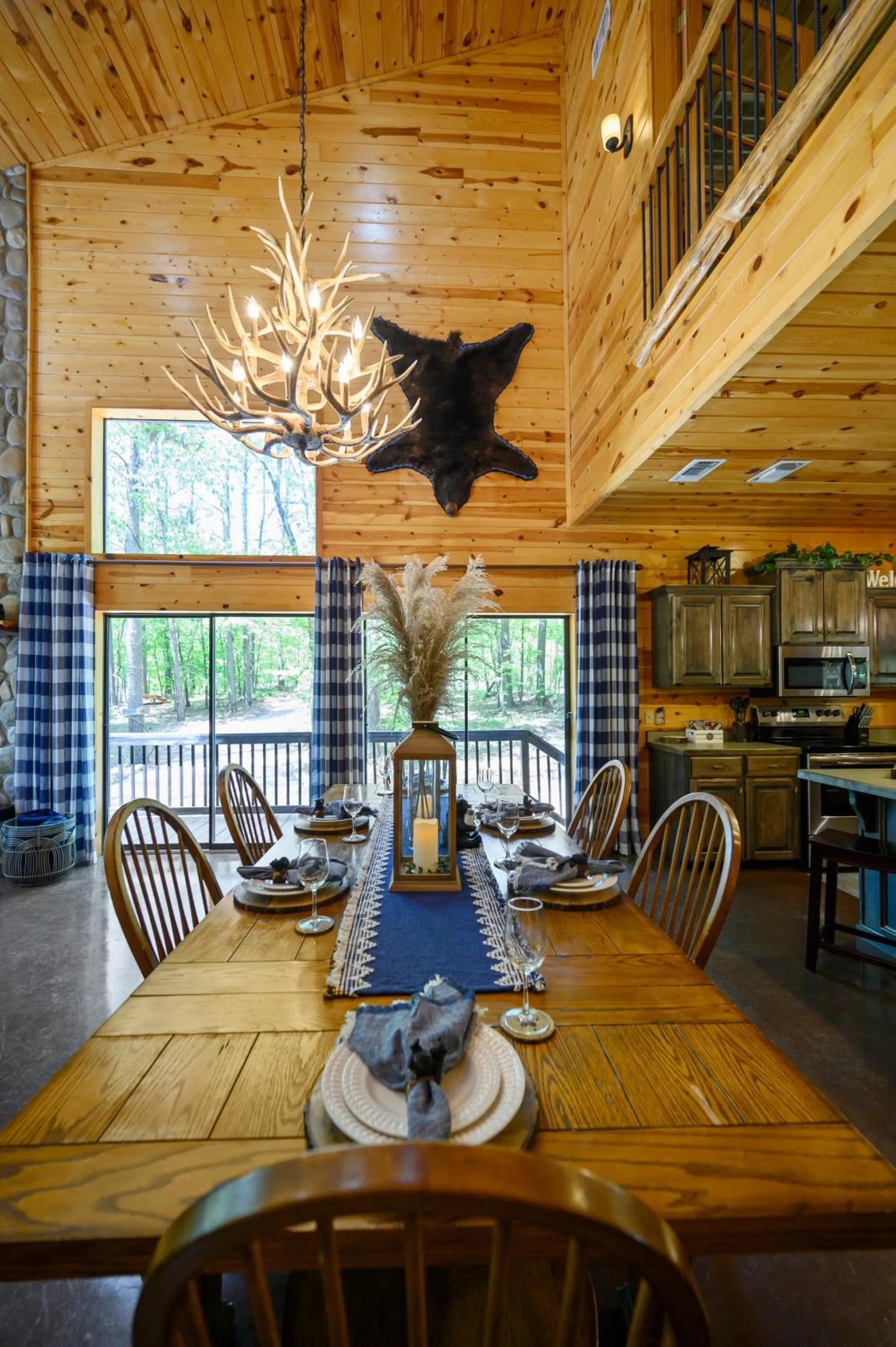 Dining area in Hickory Bear - Cabin surrounded by pines, Sleeps 10, Hot Tub, Fire Pit, Arcade, Foosball Table & Deck Slide