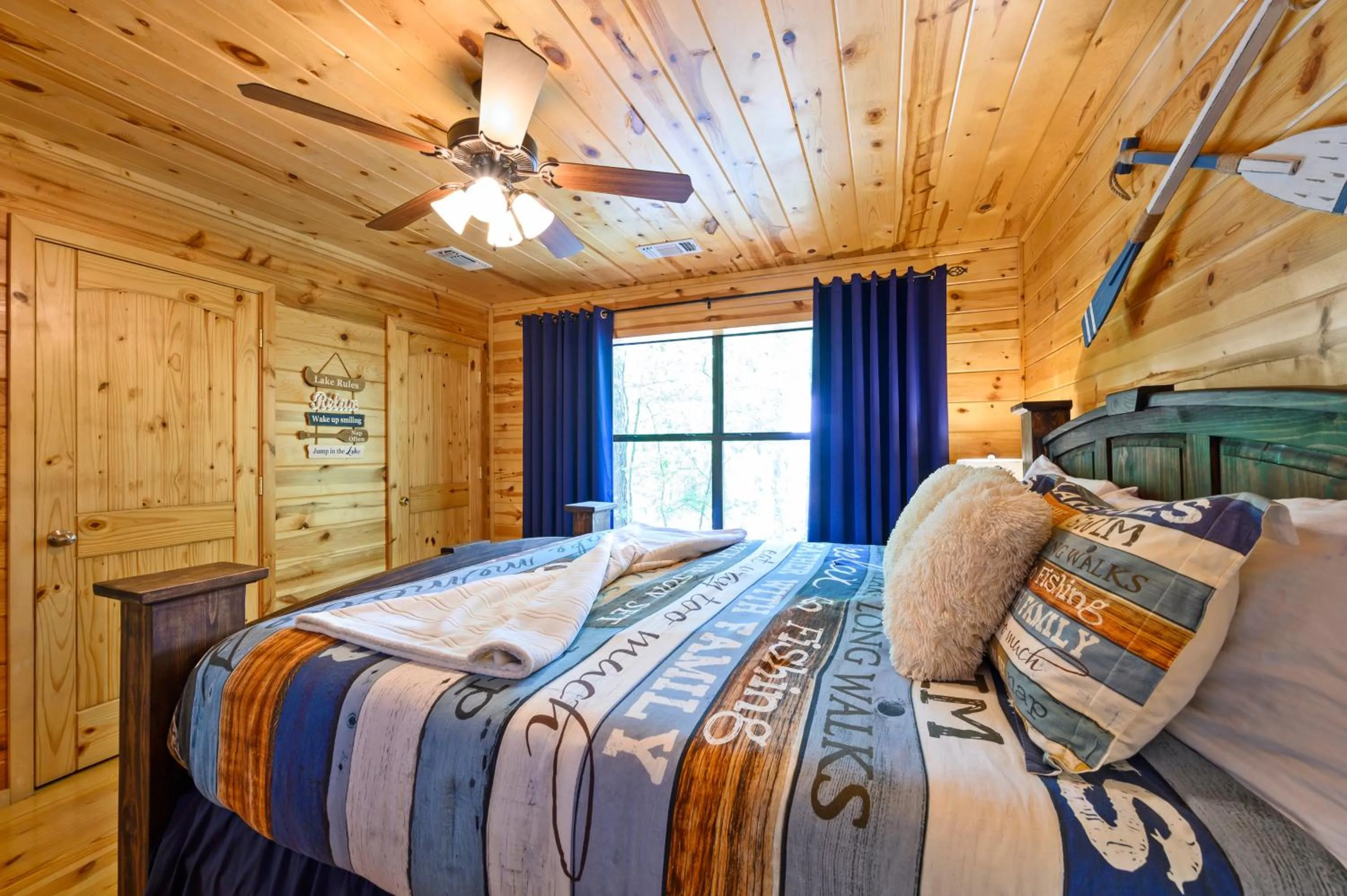 Bedroom, Bed in Hickory Bear - Cabin surrounded by pines, Sleeps 10, Hot Tub, Fire Pit, Arcade, Foosball Table & Deck Slide