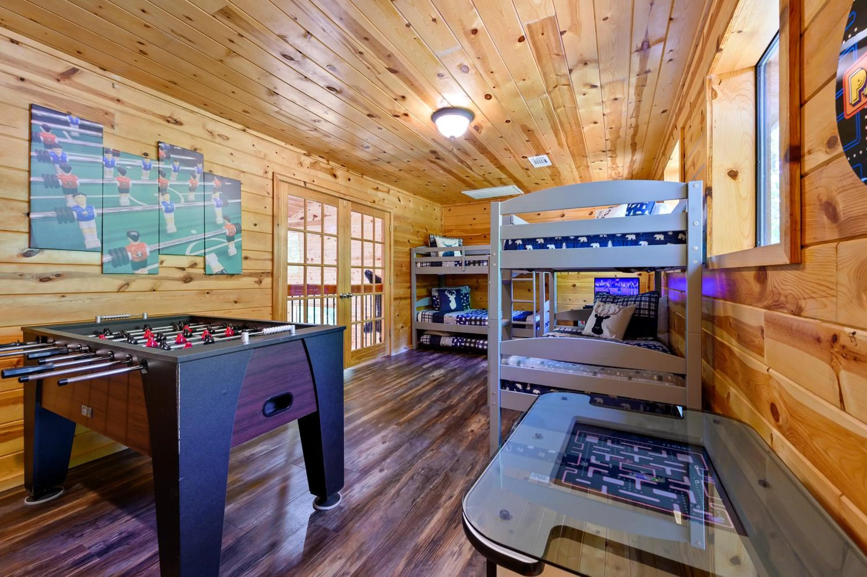 TV and multimedia in Hickory Bear - Cabin surrounded by pines, Sleeps 10, Hot Tub, Fire Pit, Arcade, Foosball Table & Deck Slide