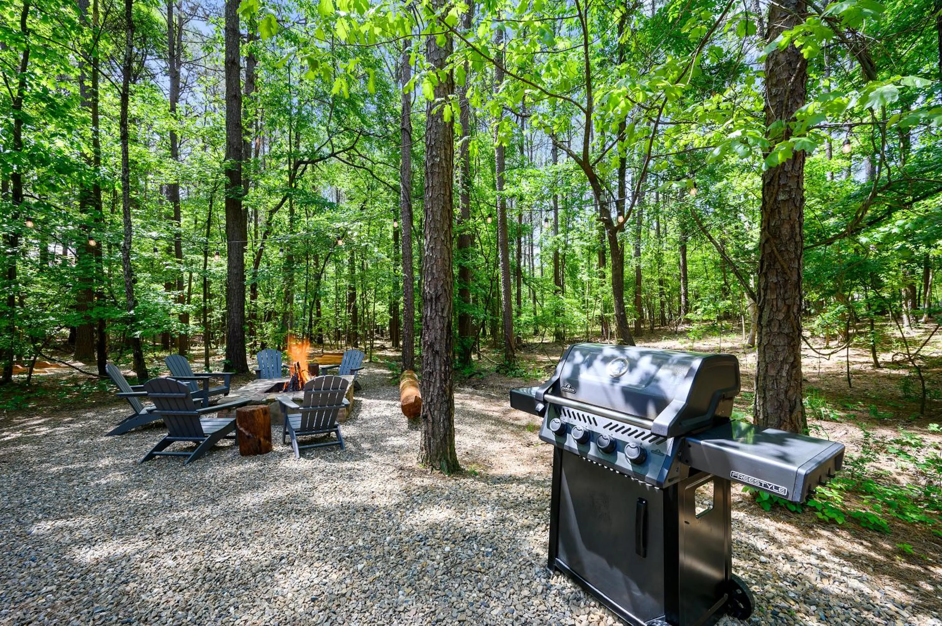 Evening entertainment in Hickory Bear - Cabin surrounded by pines, Sleeps 10, Hot Tub, Fire Pit, Arcade, Foosball Table & Deck Slide