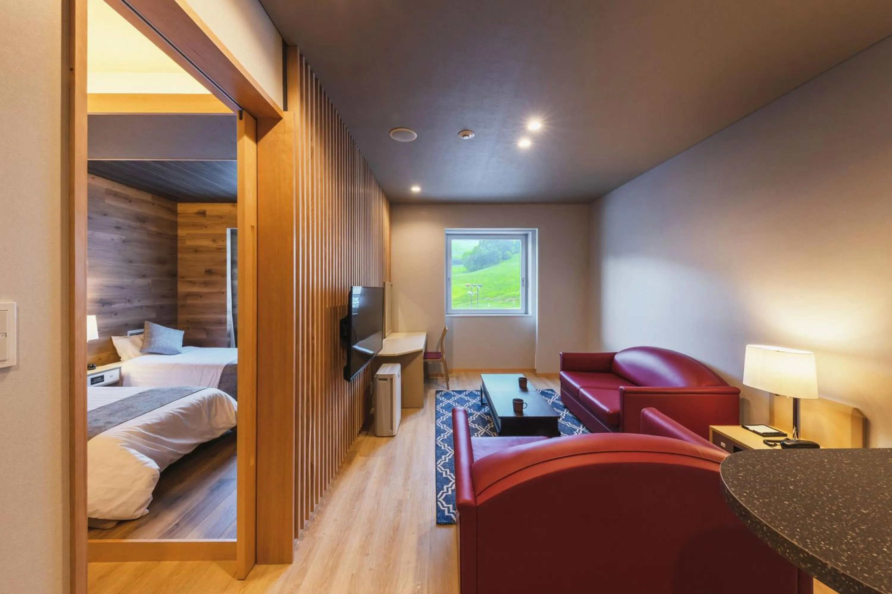 Bed in Takamiya Hotel Rurikura Resort