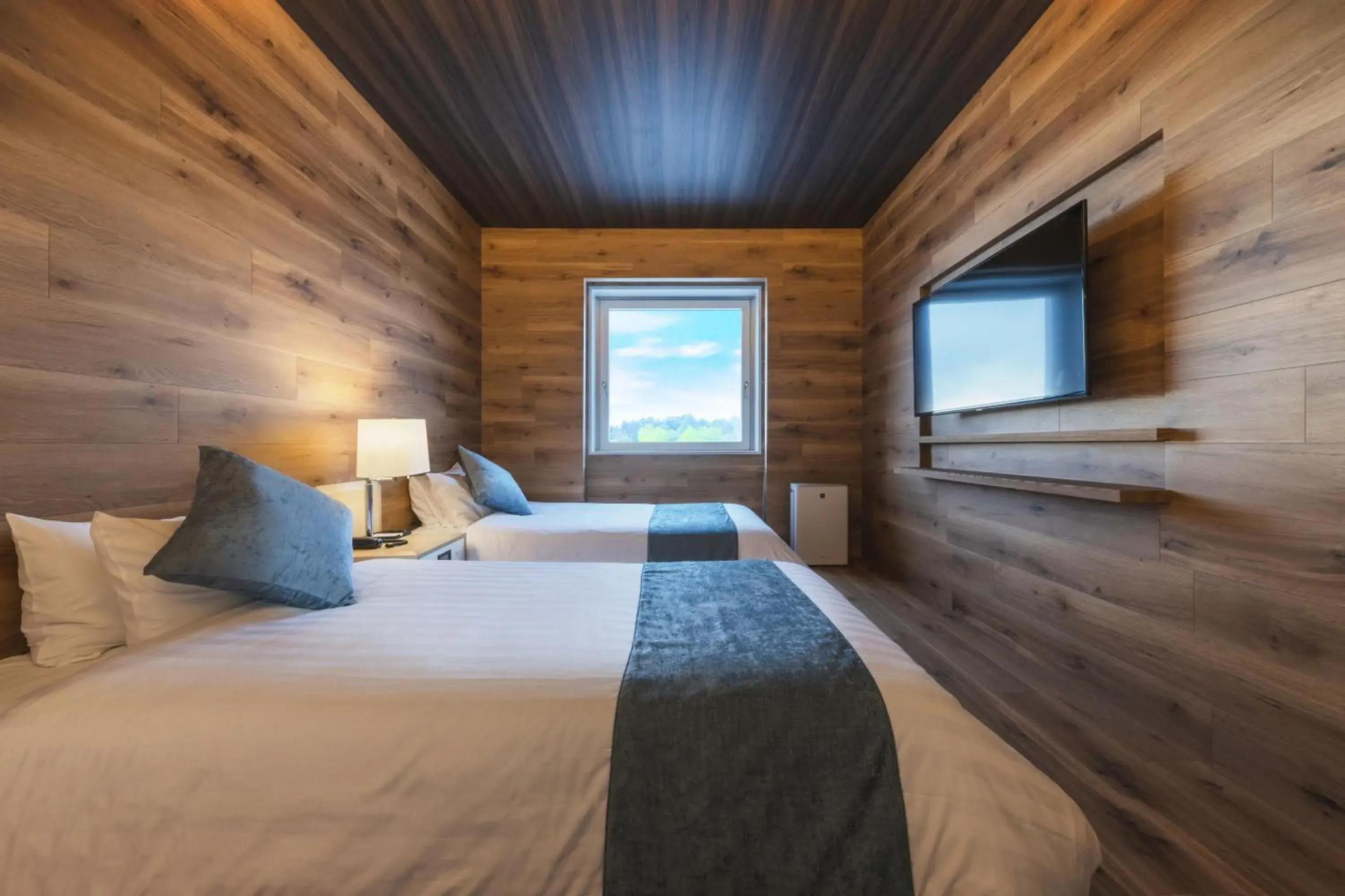 Bed in Takamiya Hotel Rurikura Resort Bed in Takamiya Hotel Rurikura Resort