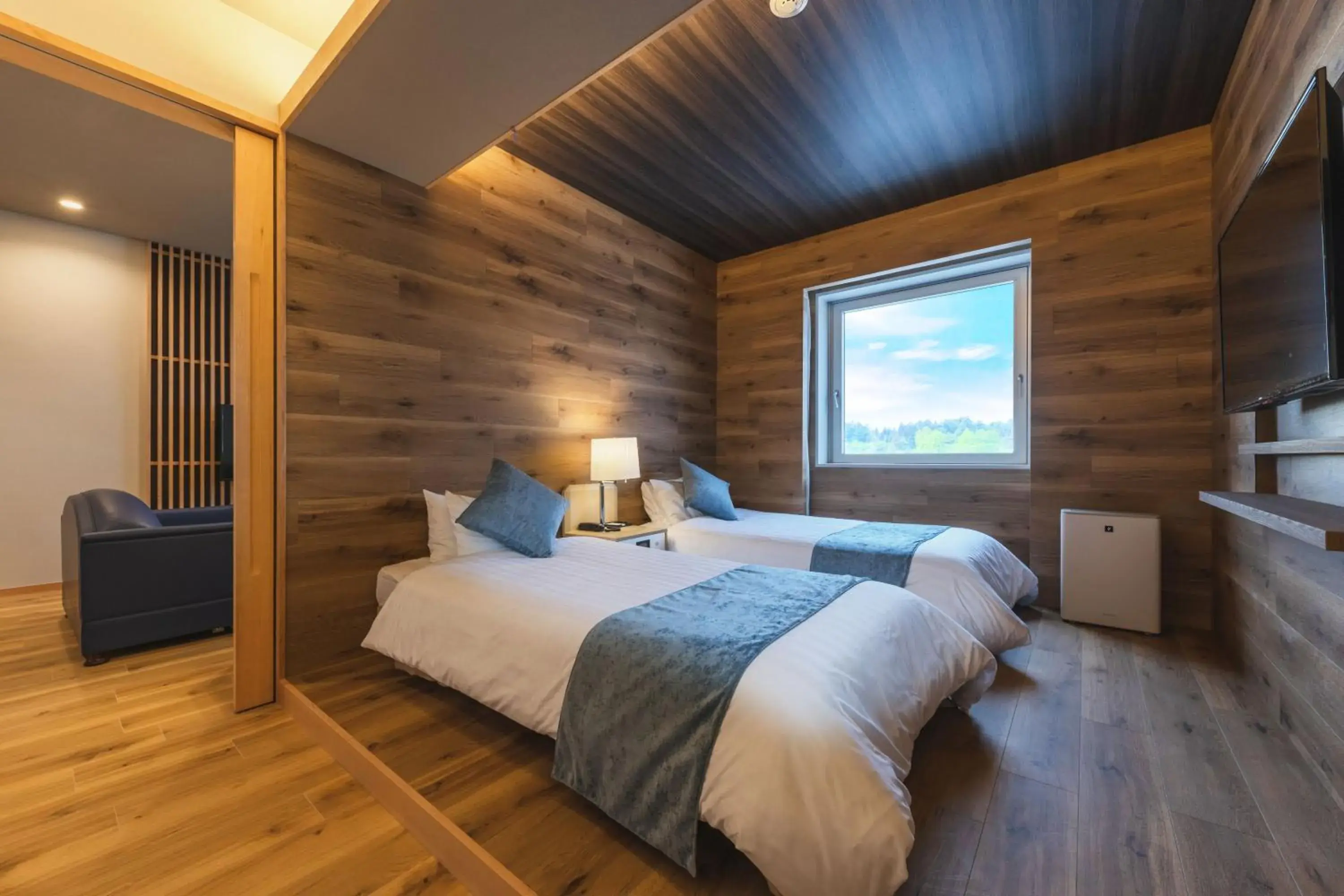 Bed in Takamiya Hotel Rurikura Resort Bed in Takamiya Hotel Rurikura Resort