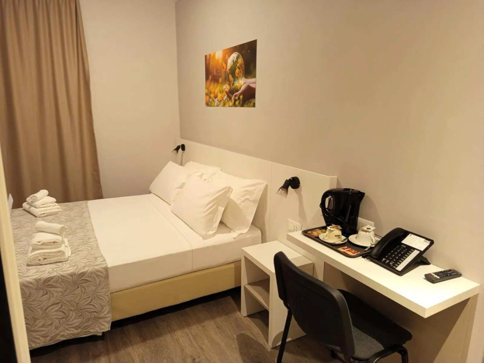 Bed in Hotel Acquario