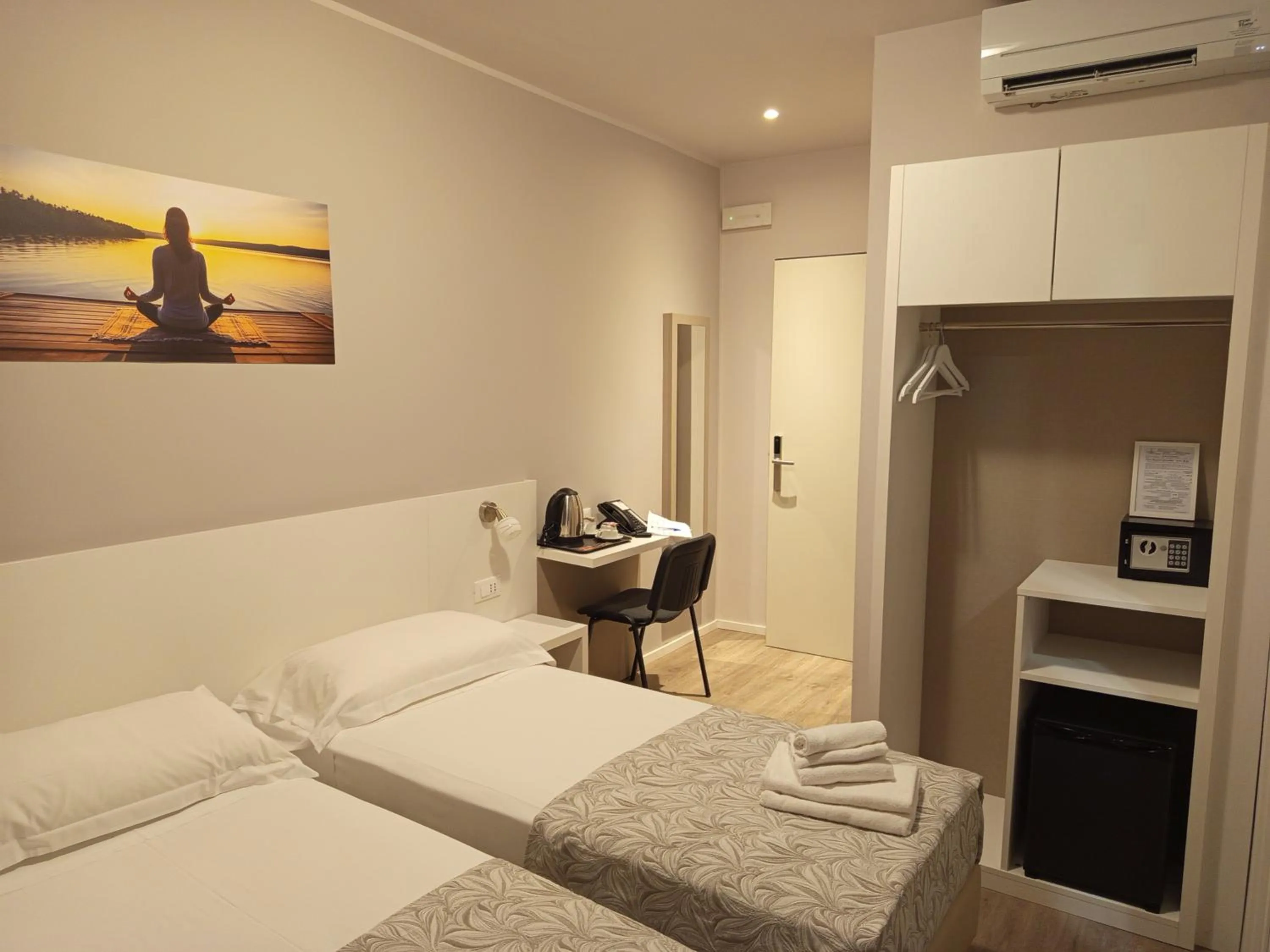 Bed in Hotel Acquario