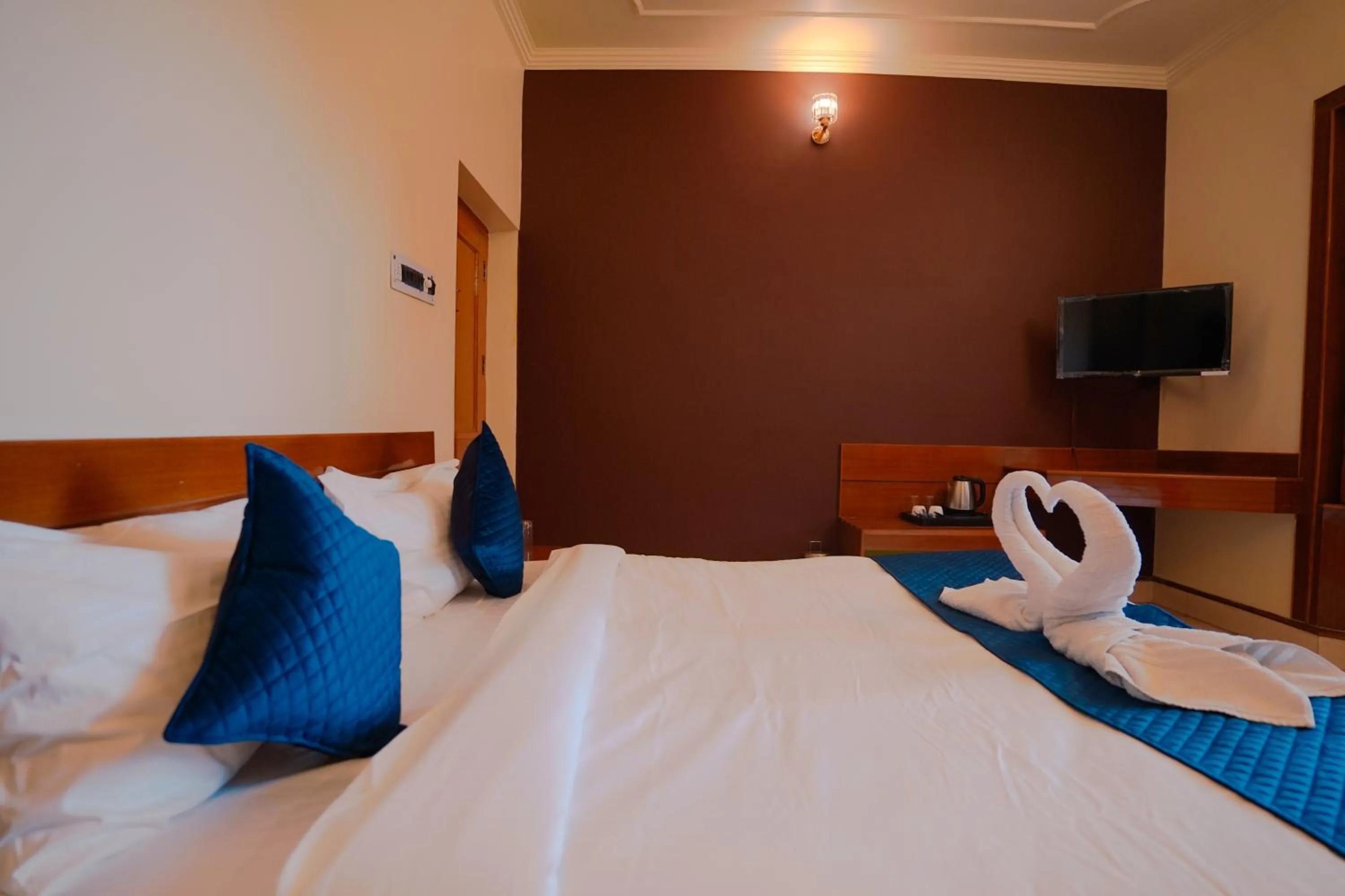 Bed in Chirping Hills Resort,Bhimtal