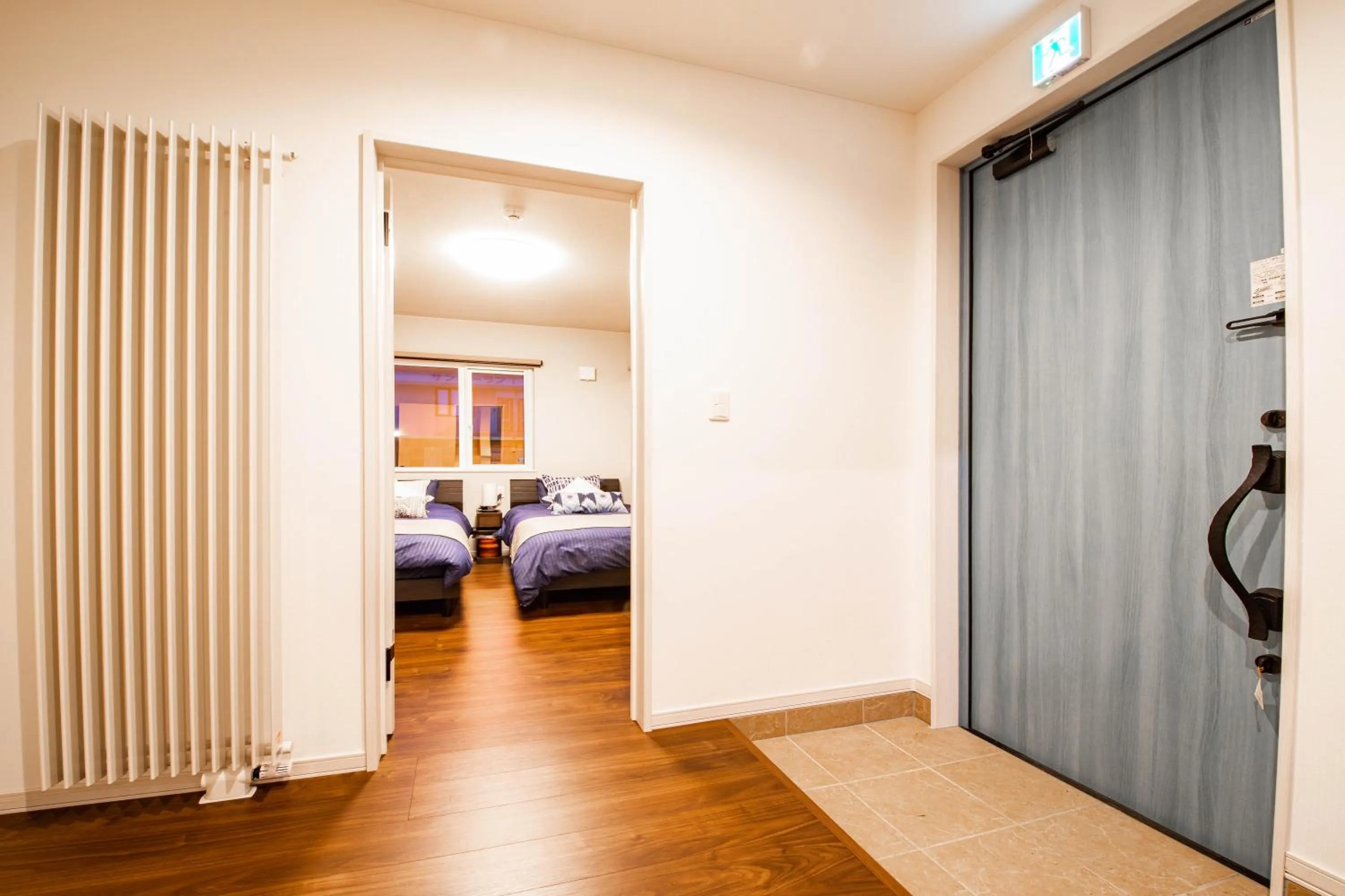 Facade/entrance, Bed in THE SUN LOUNGE