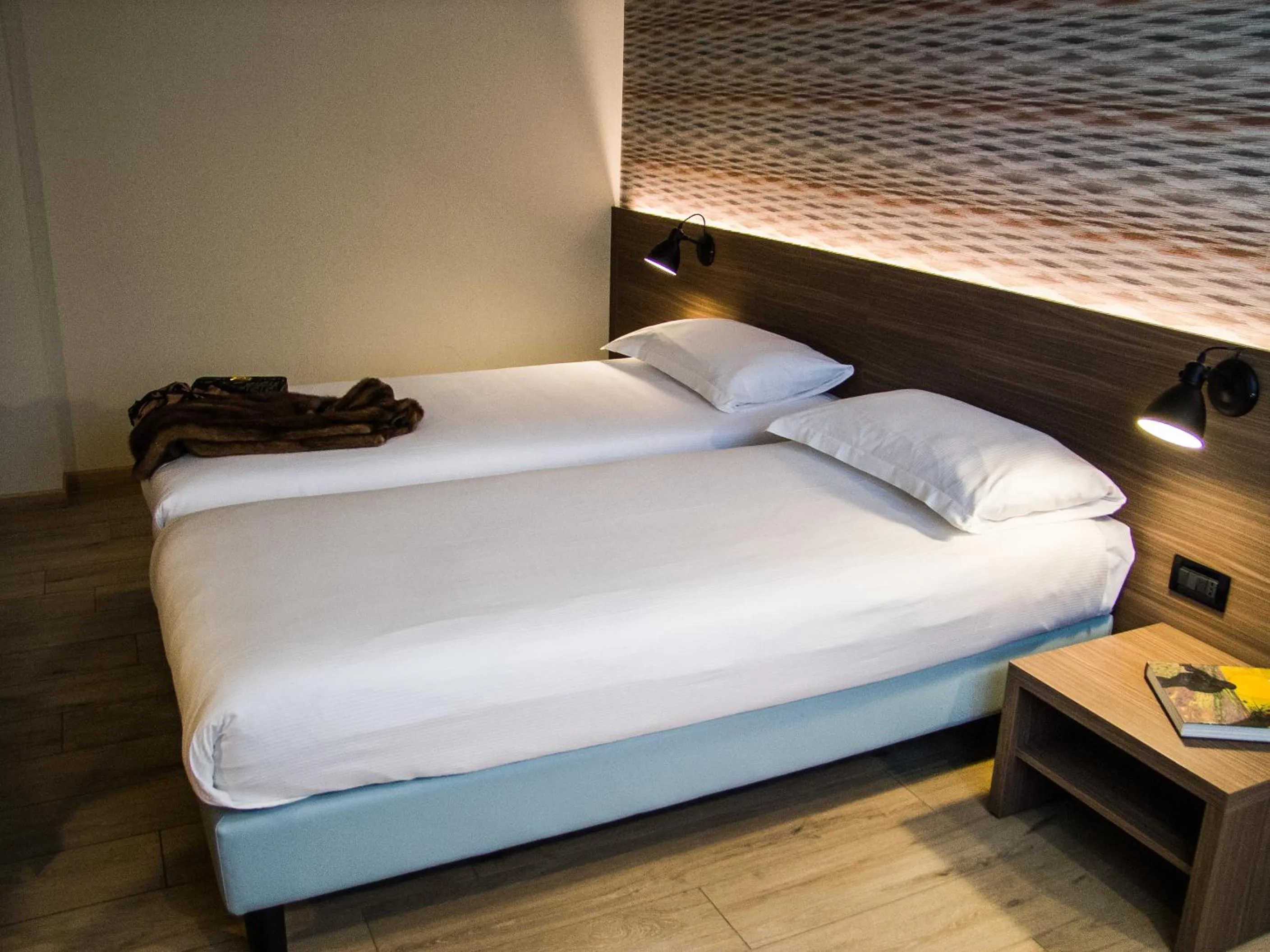 Bed in Hotel Ambra