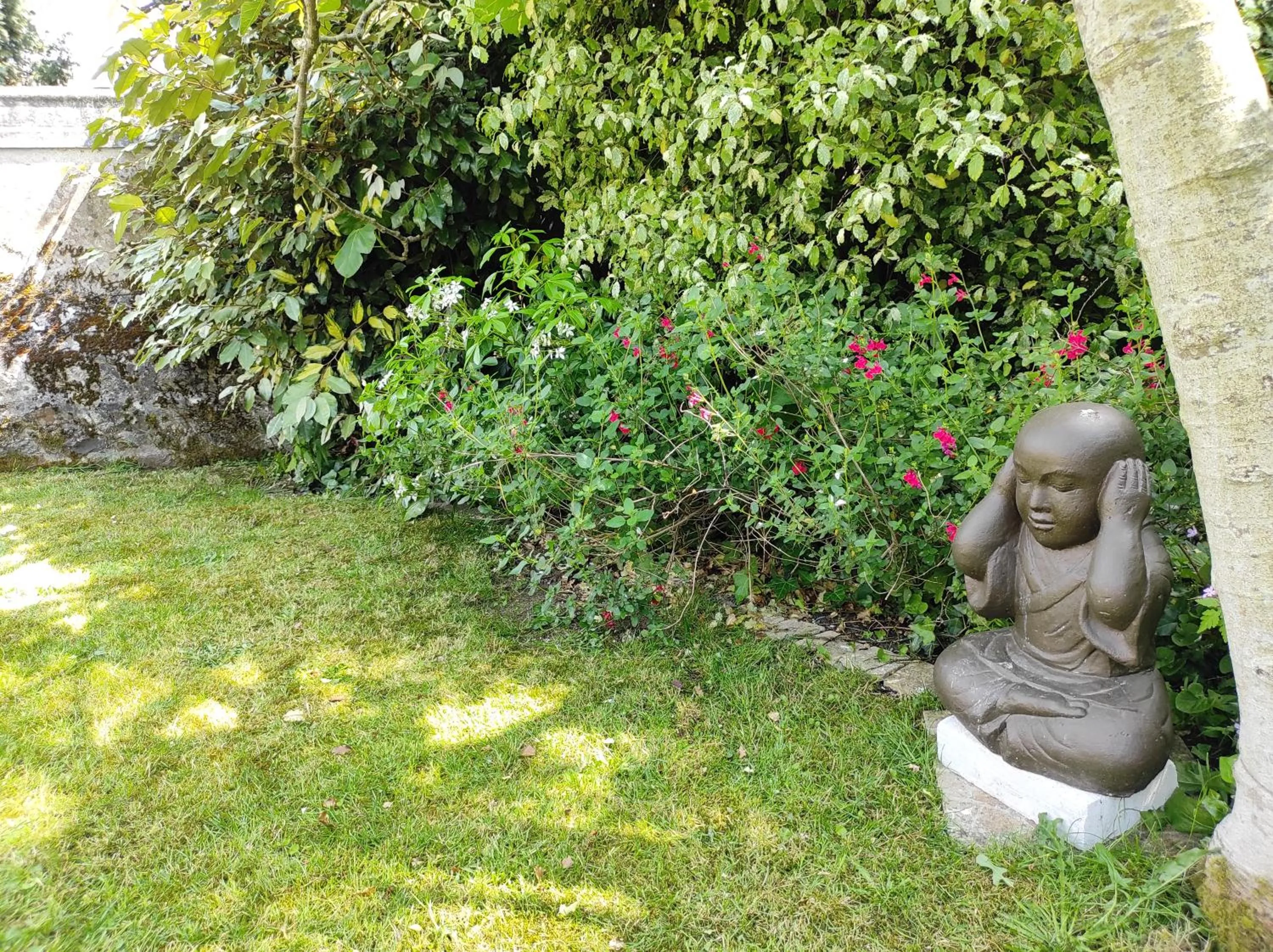 Garden in Aux Trois Palmiers