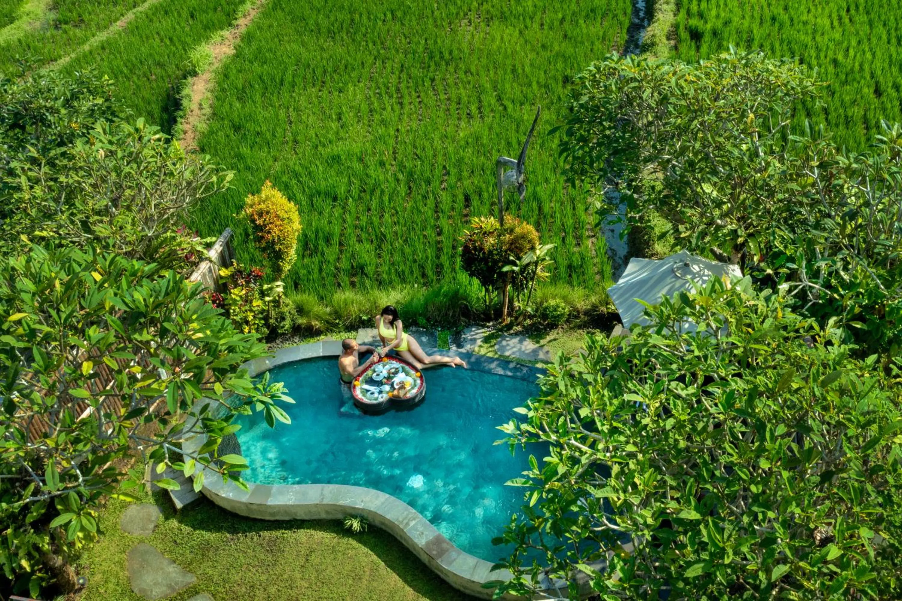 Pool view in Wooden Ganeca Villas by GenuineHost