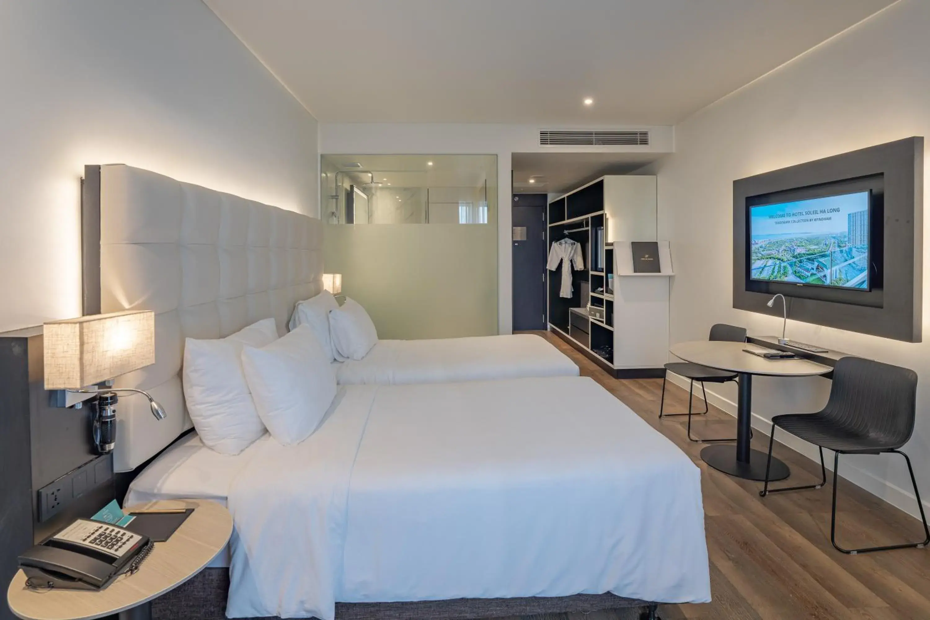 Bed in Hotel Soleil Ha Long, Trademark Collection by Wyndham Bed in Hotel Soleil Ha Long, Trademark Collection by Wyndham