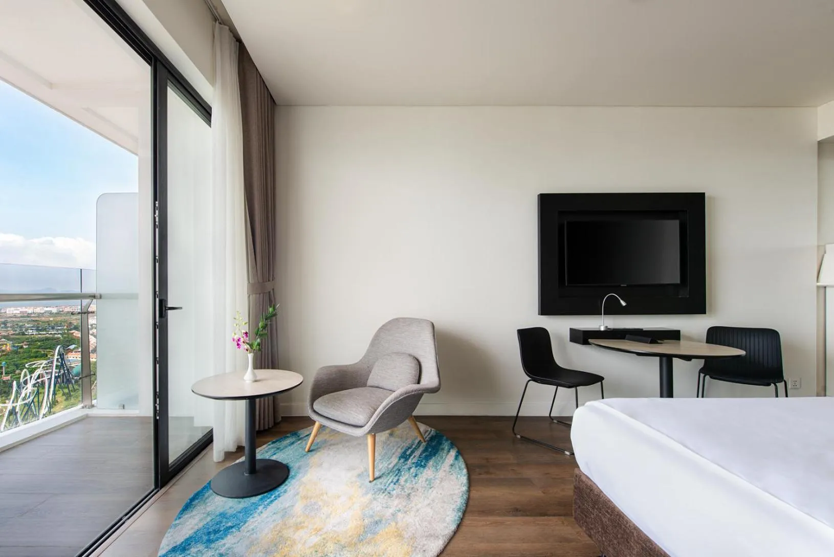 Seating area, Bed in Hotel Soleil Ha Long, Trademark Collection by Wyndham