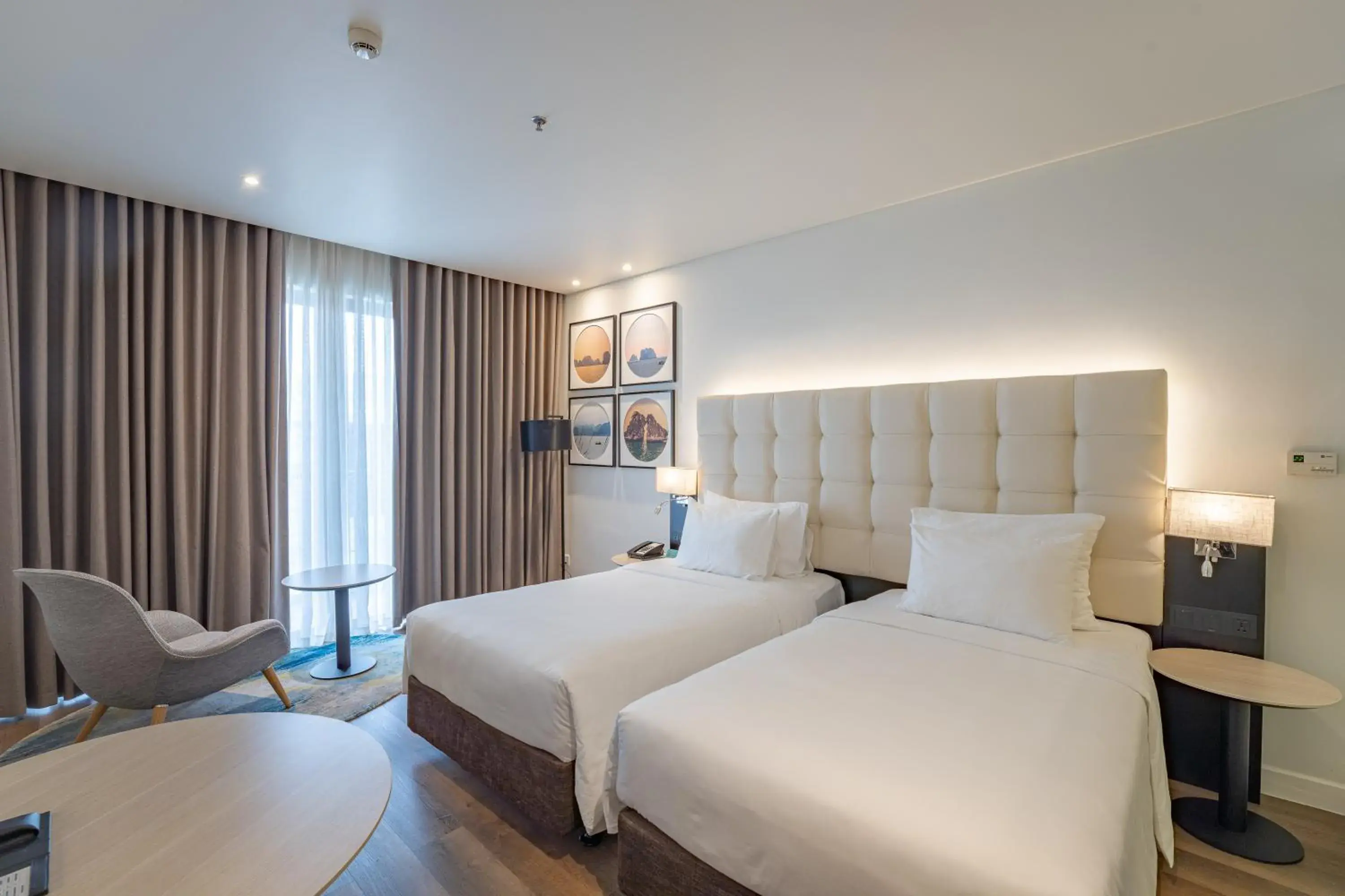 Bed in Hotel Soleil Ha Long, Trademark Collection by Wyndham Bed in Hotel Soleil Ha Long, Trademark Collection by Wyndham