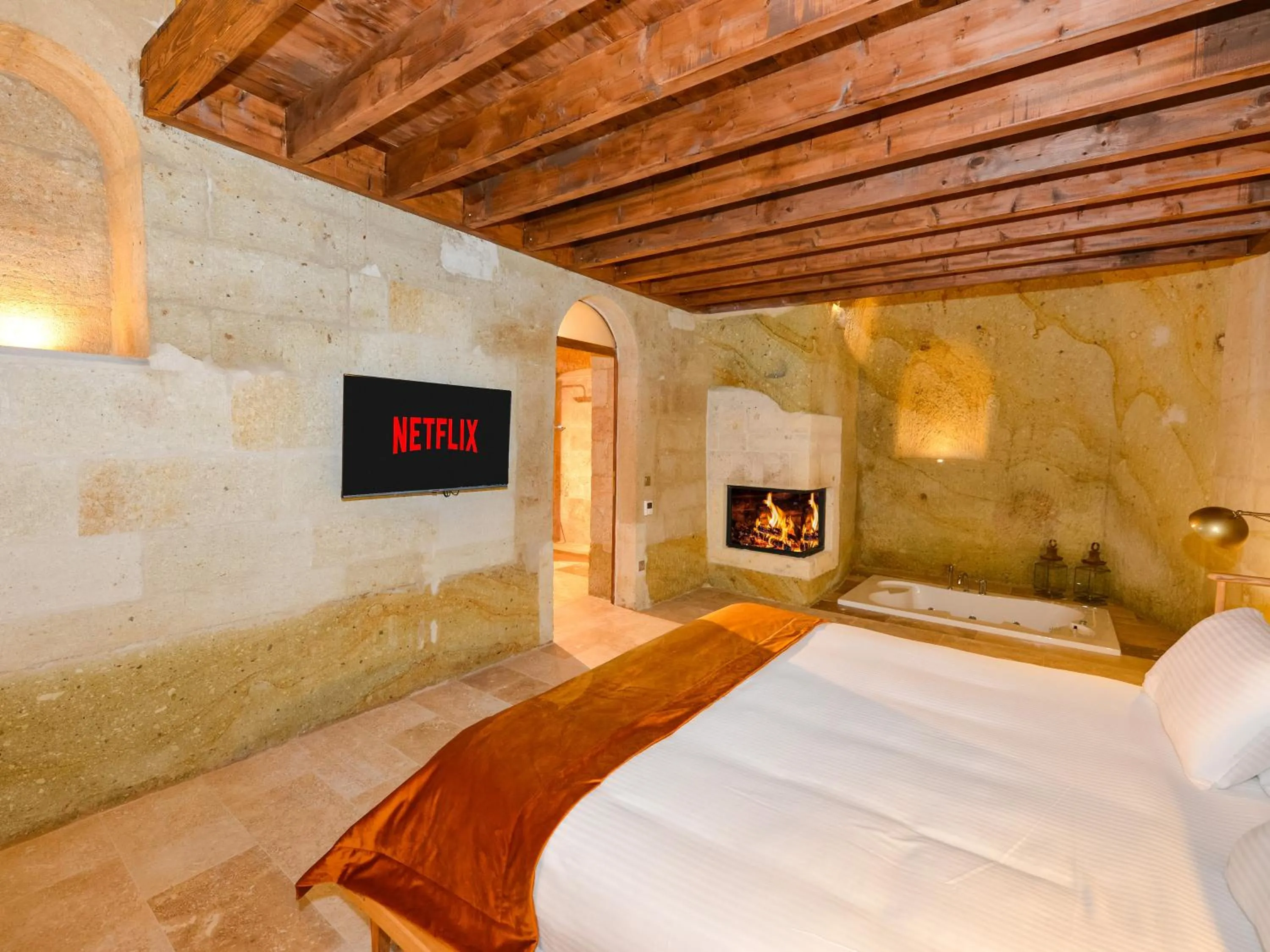 Bed in Evanthia Cave Suites - Special Class