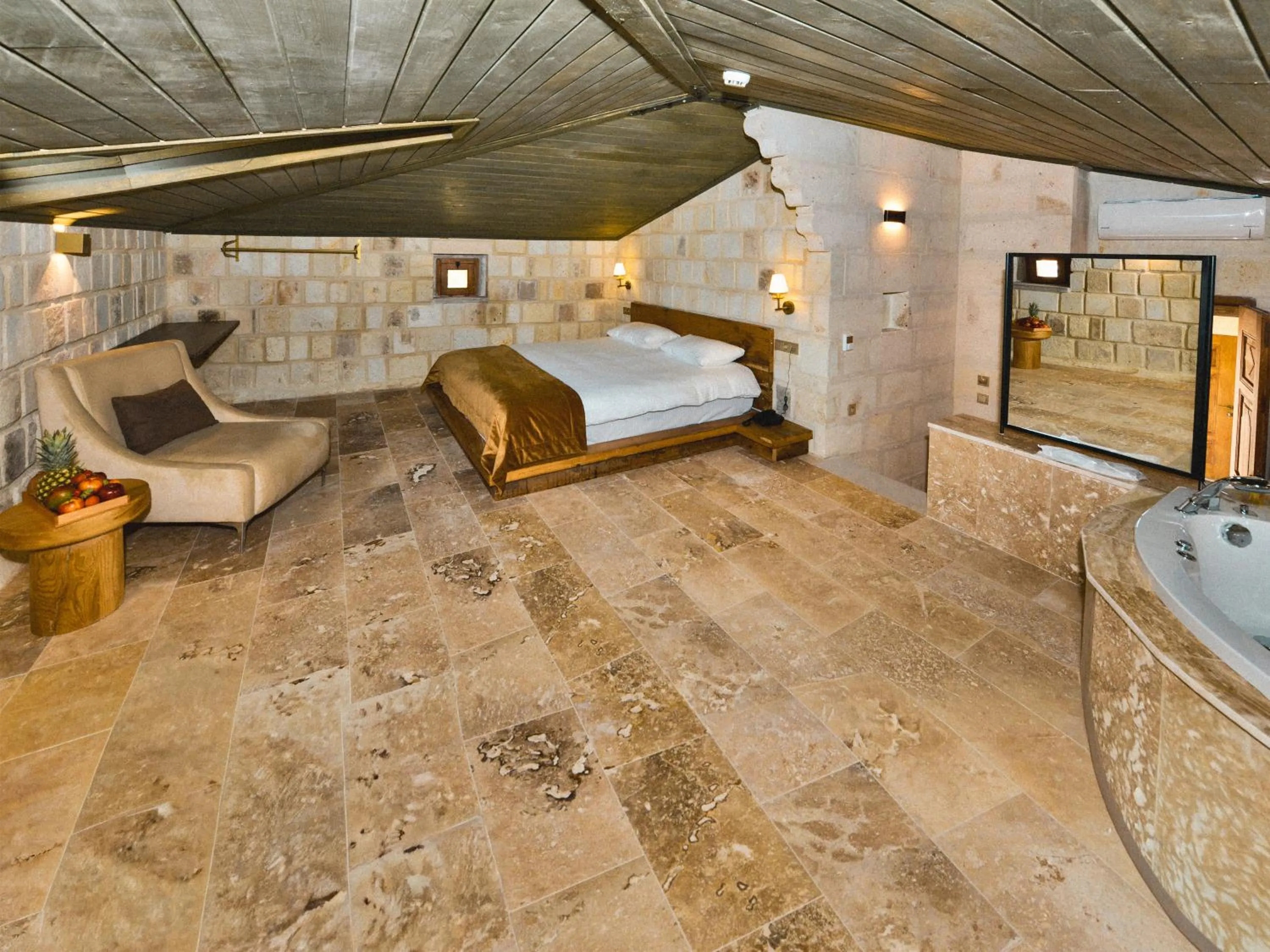 Bed in Evanthia Cave Suites - Special Class