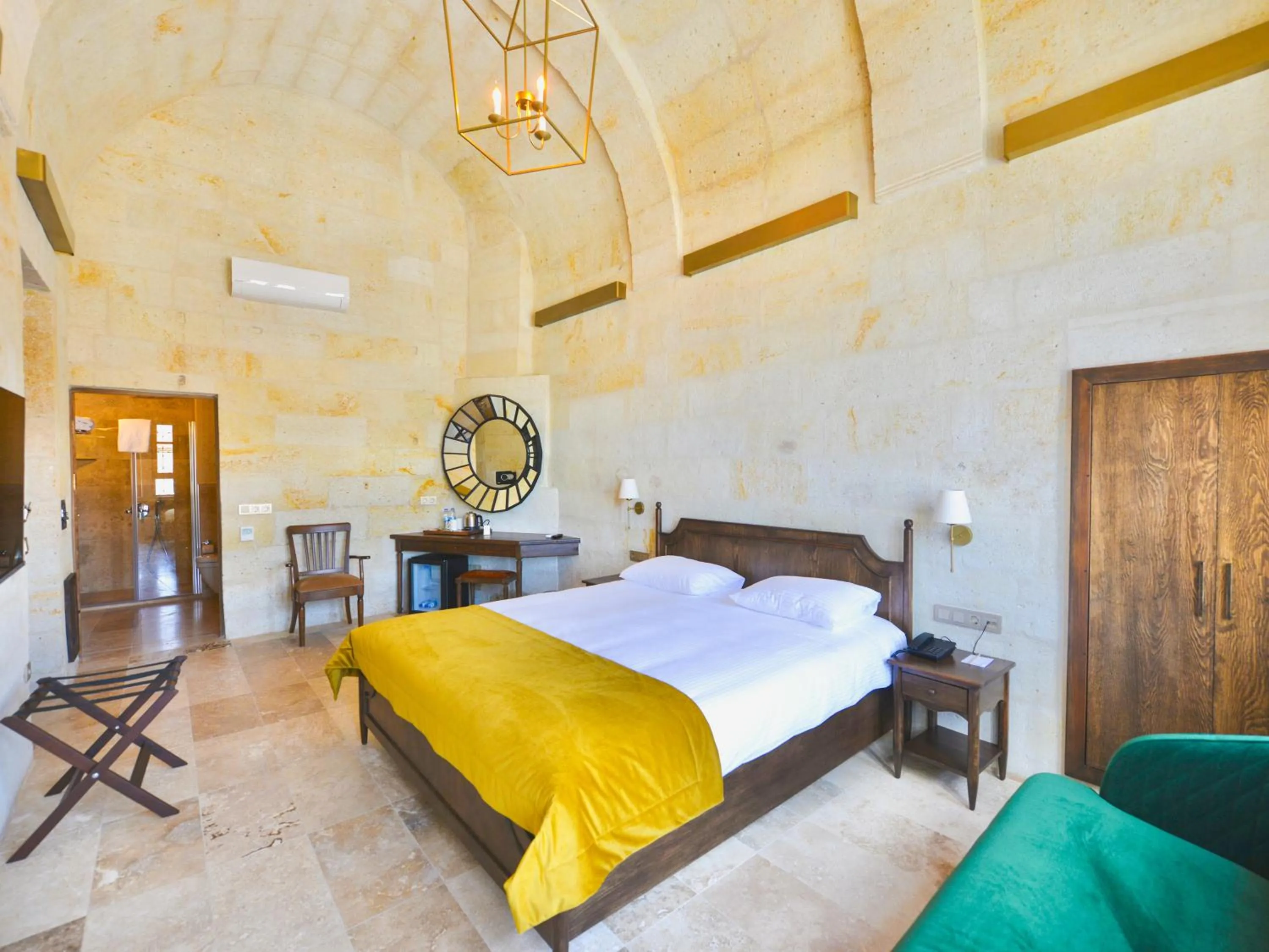 Bed in Evanthia Cave Suites - Special Class