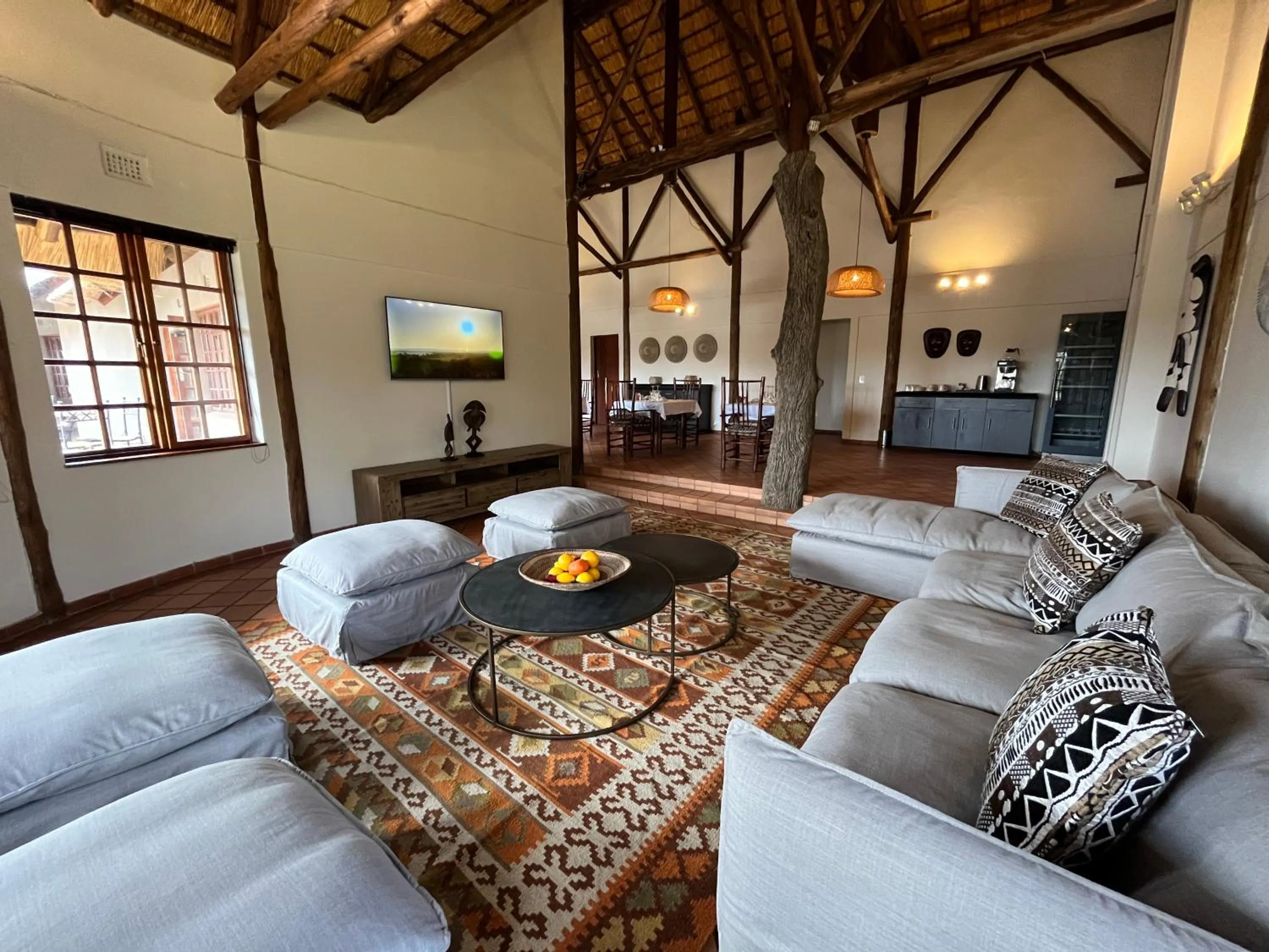 Communal lounge/ TV room in MILIMA Big 5 Safari Lodge