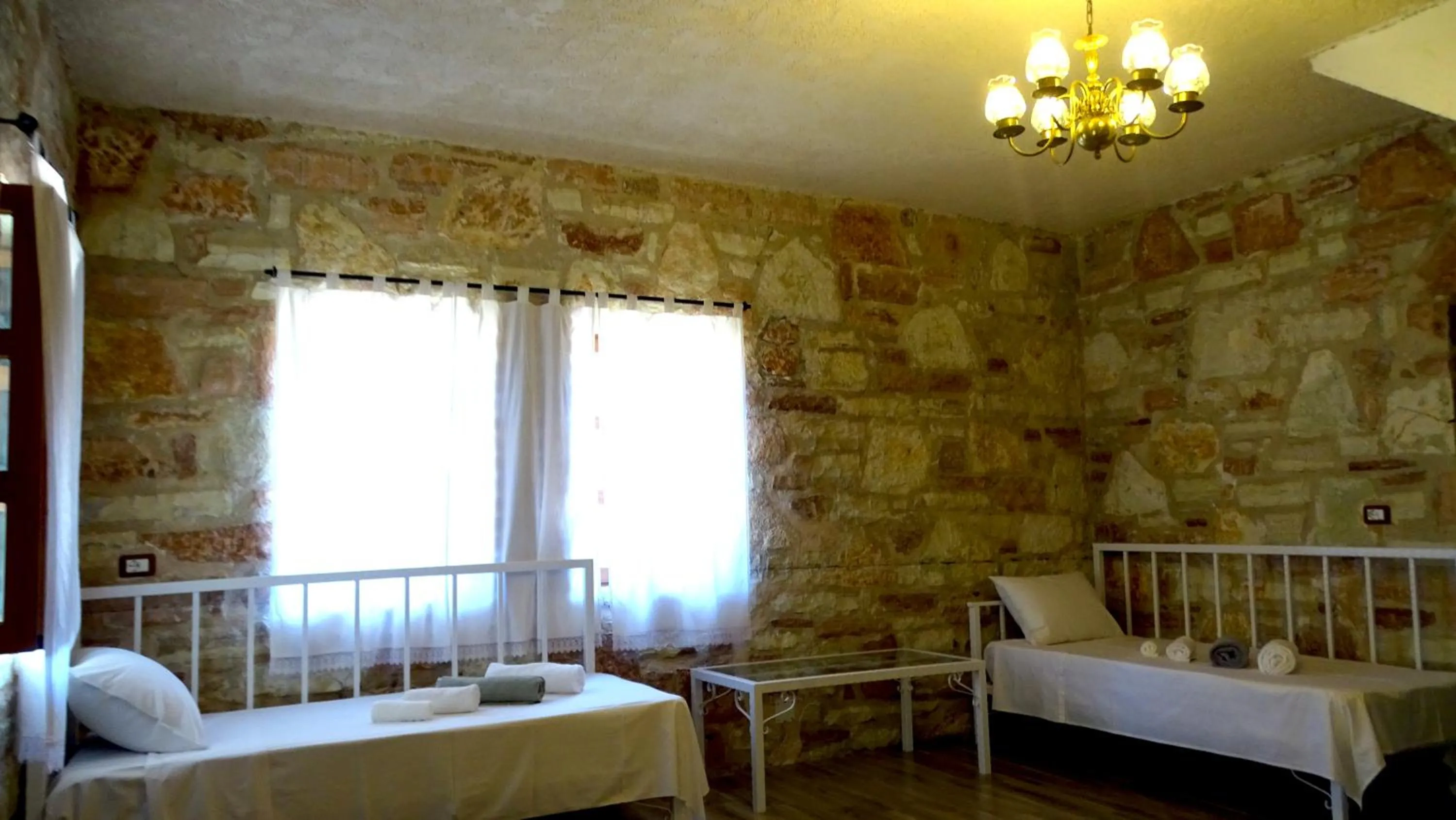 Living room, Bed in Limni Resort