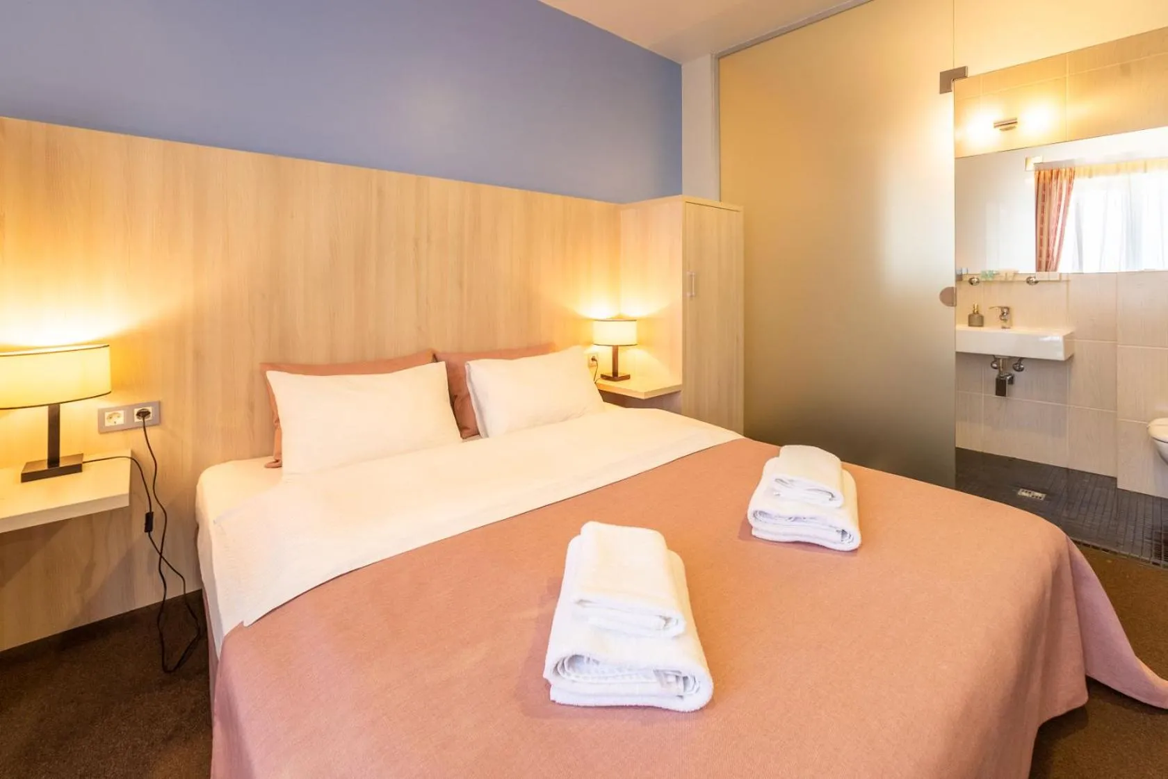 Bed in Mini-hotel People