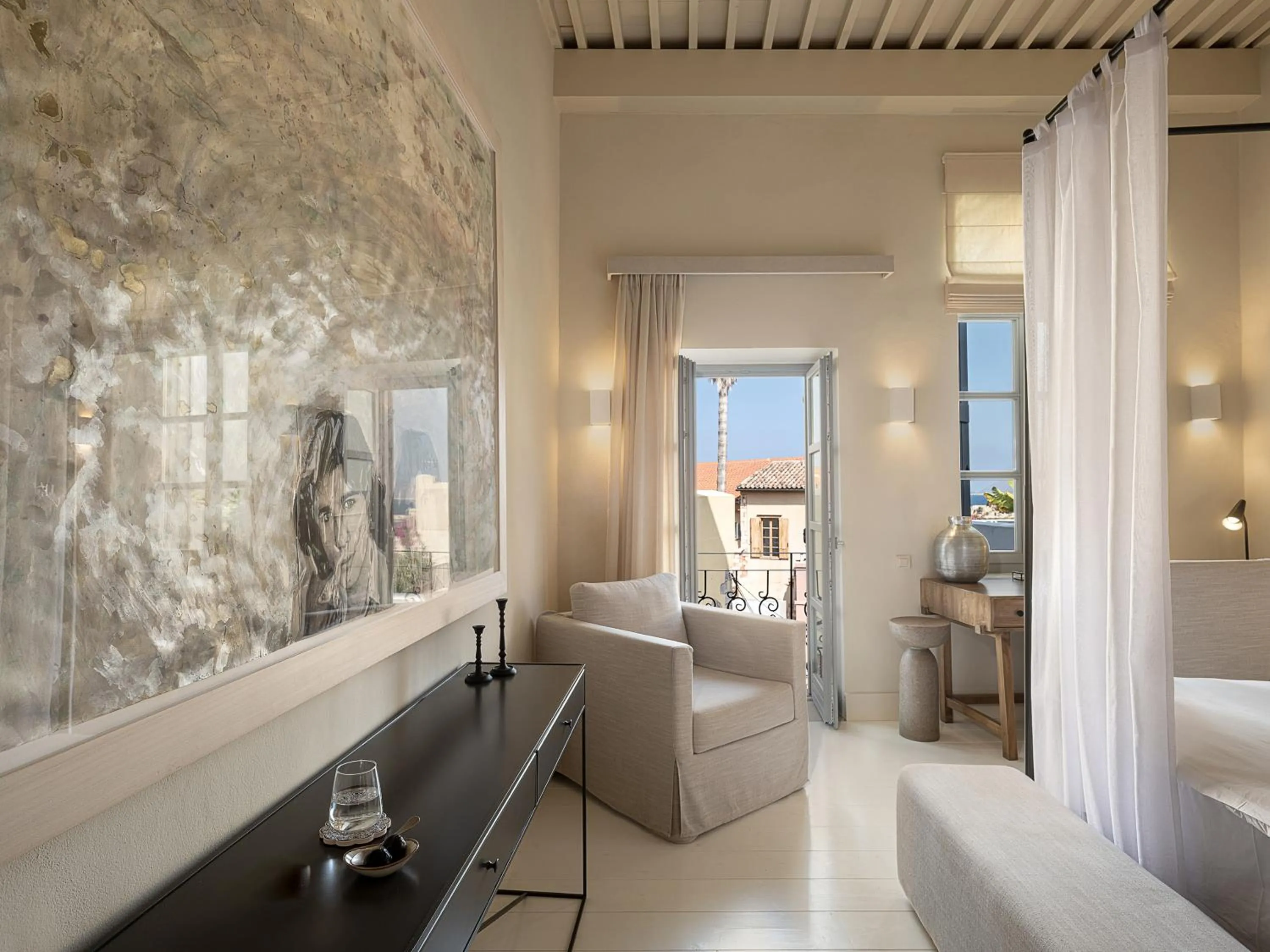 Seating area, Bed in AZADE Chania