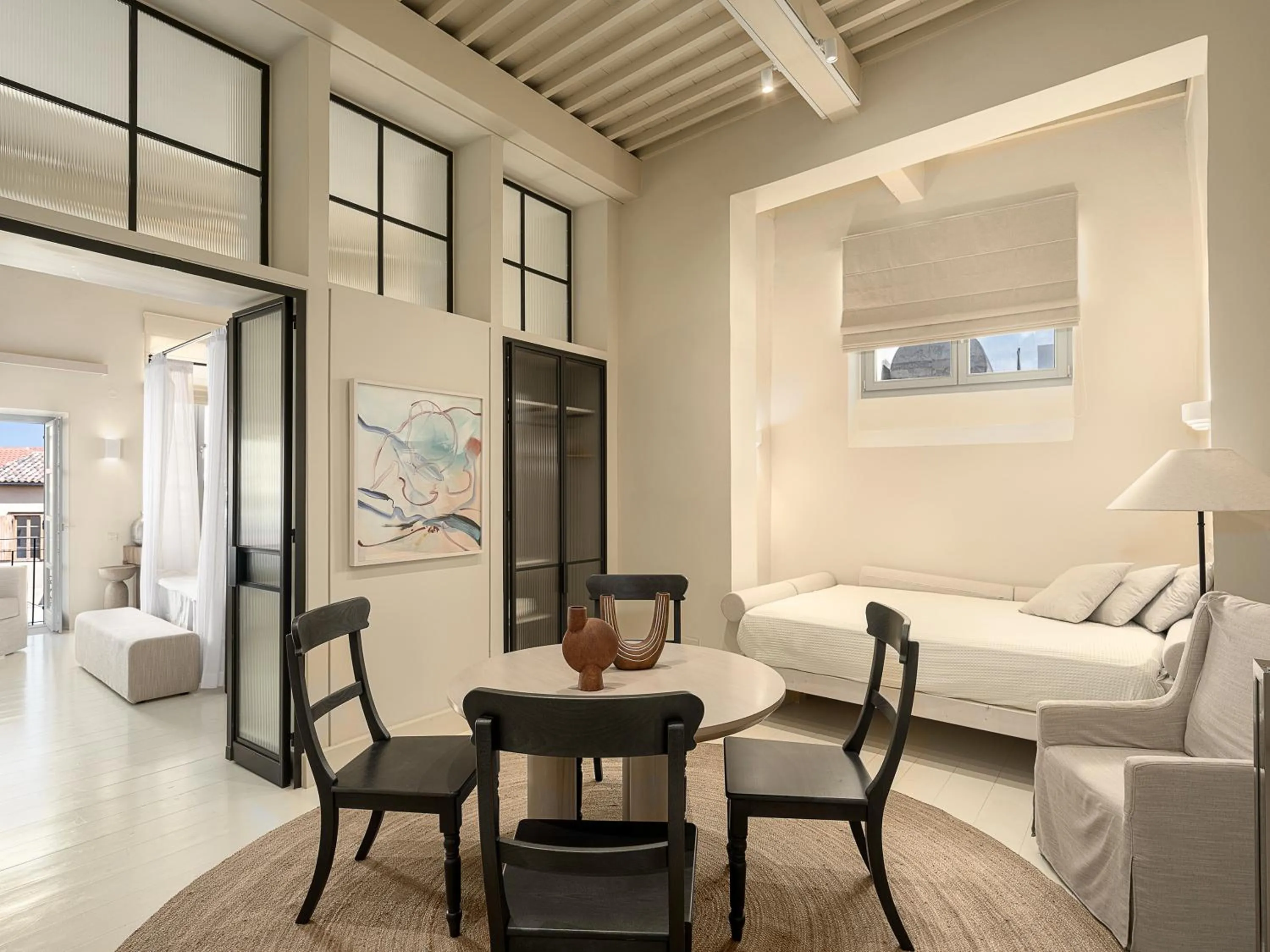 Seating area, Bed in AZADE Chania