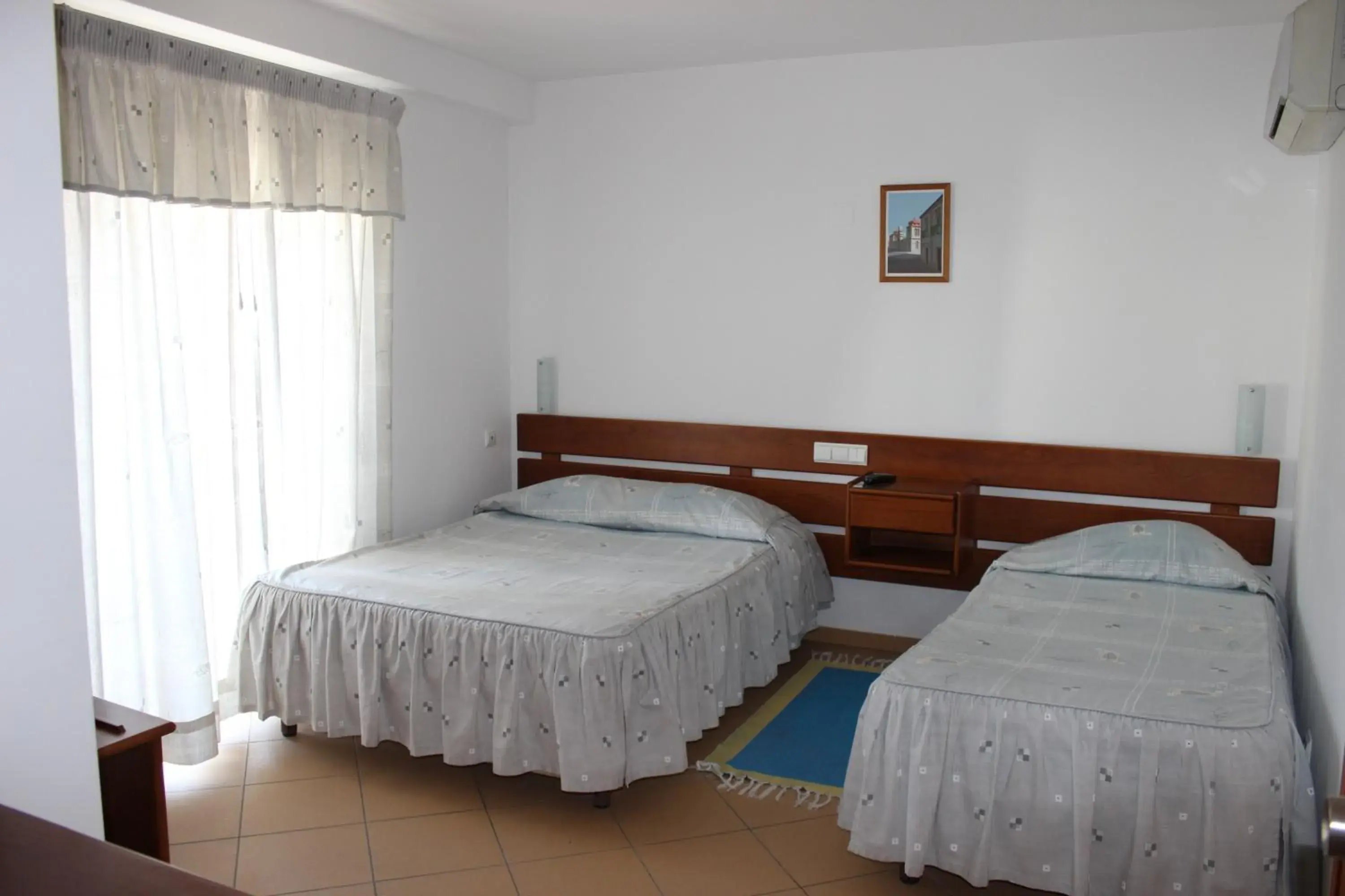 Triple Room in Dom Fernando I Triple Room in Dom Fernando I