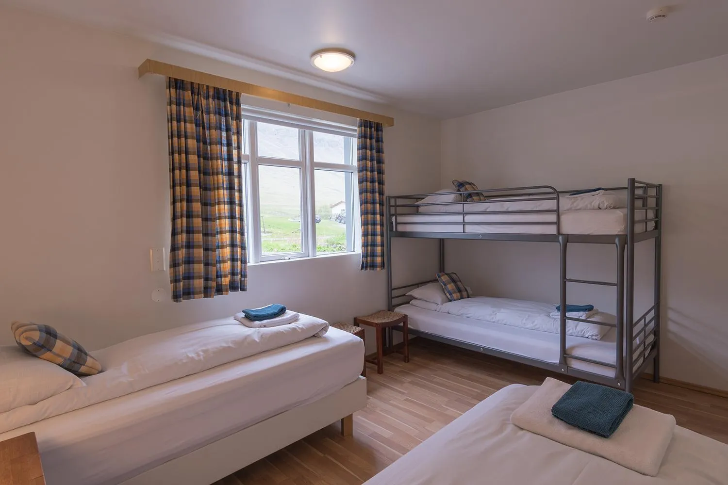 Bed in Skyrhusid HI Hostel