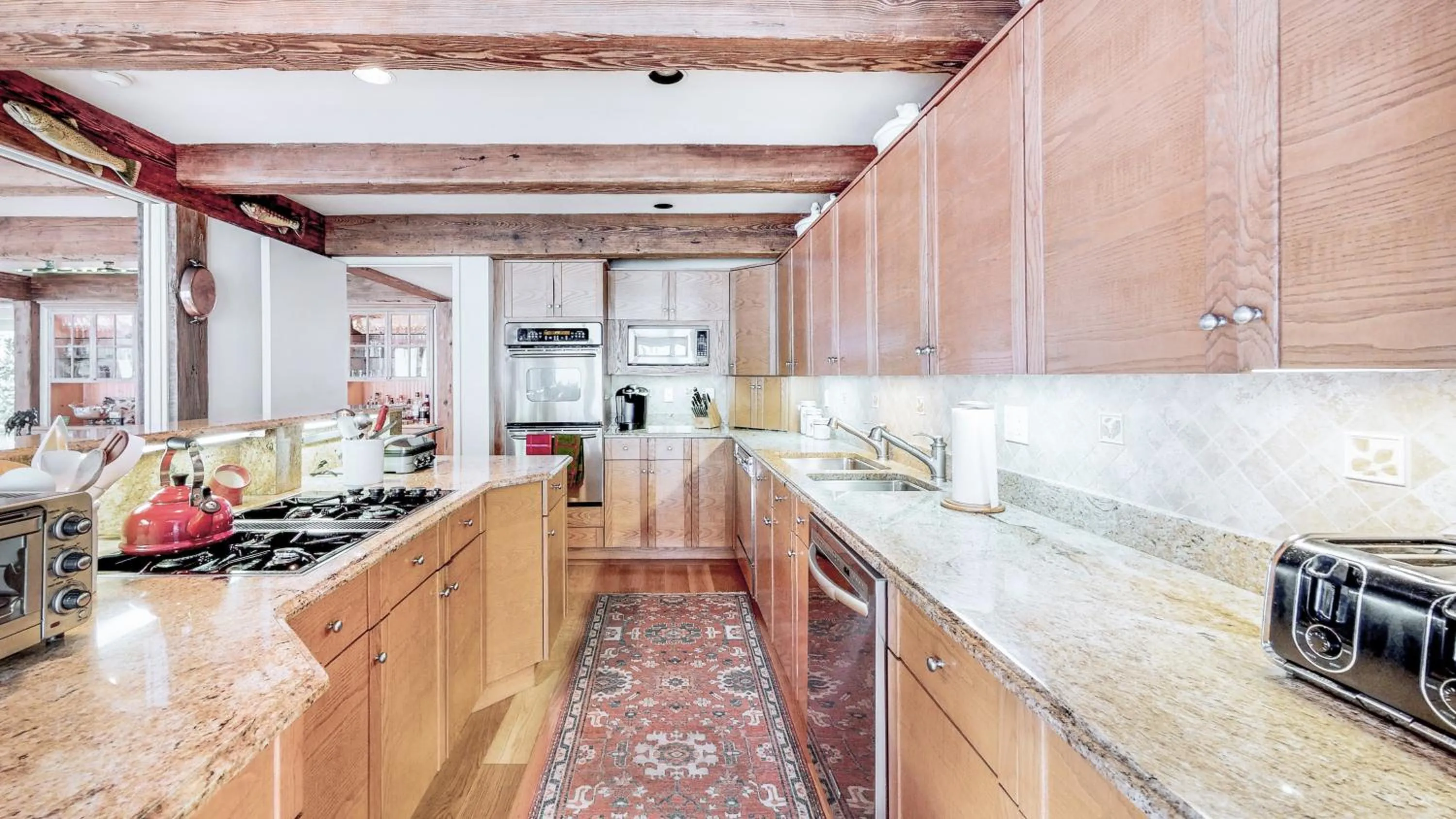 kitchen in Trails Edge by Snowmass Vacations