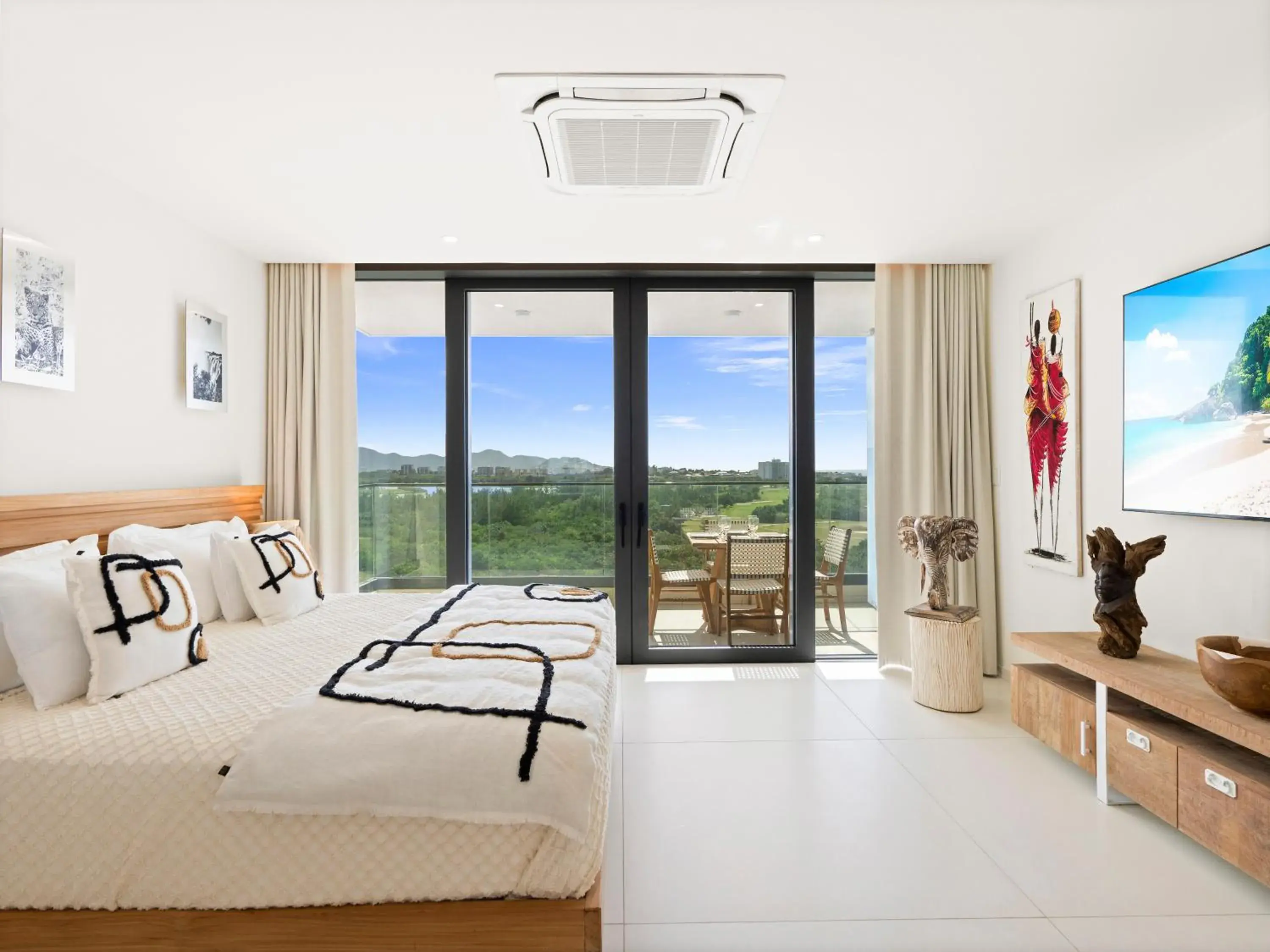 Living room, Bed in Fourteen at Mullet Bay Living room, Bed in Fourteen at Mullet Bay